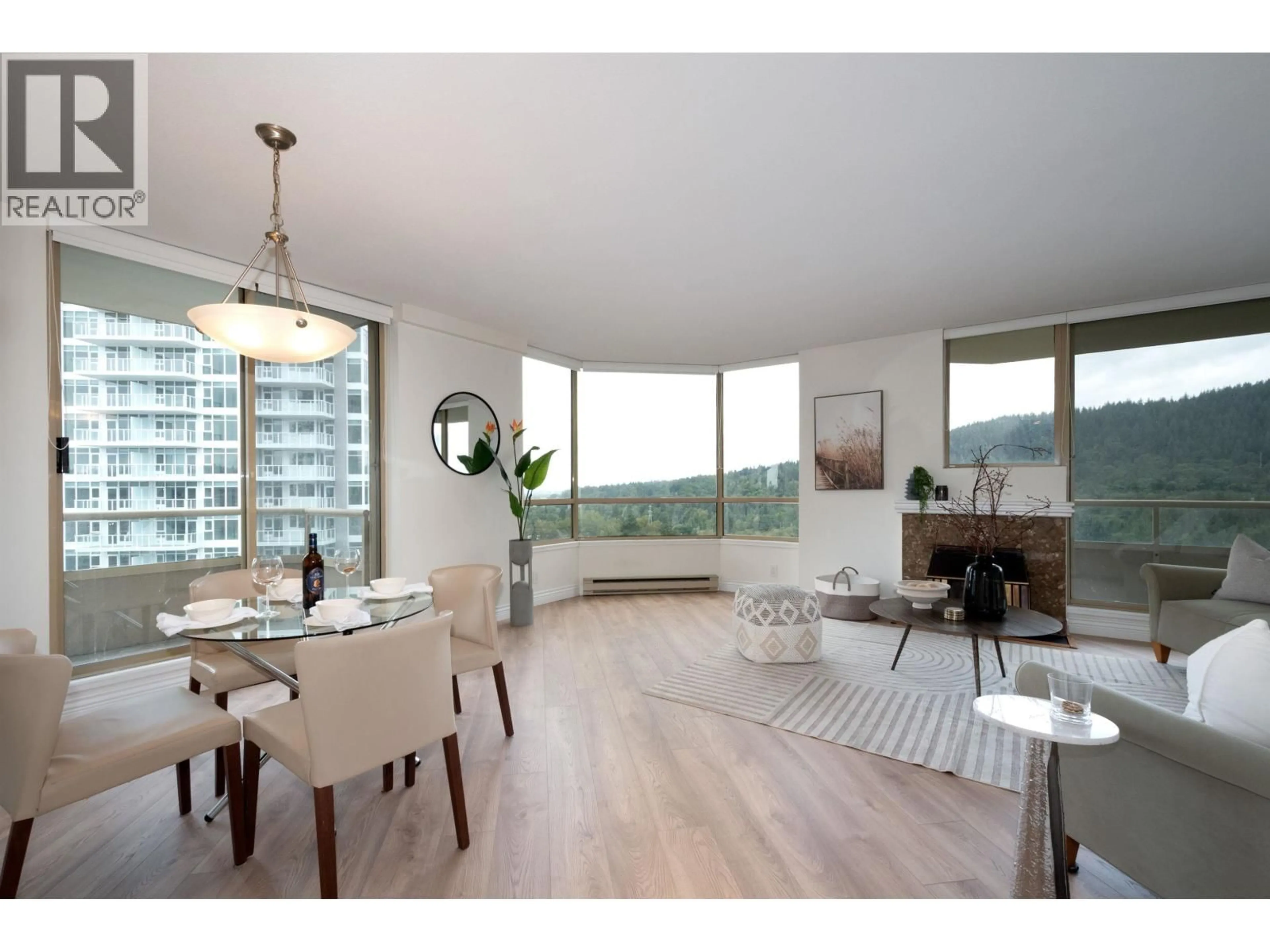 Living room with furniture, wood/laminate floor for 1203 - 728 FARROW STREET, Coquitlam British Columbia V3J3S6