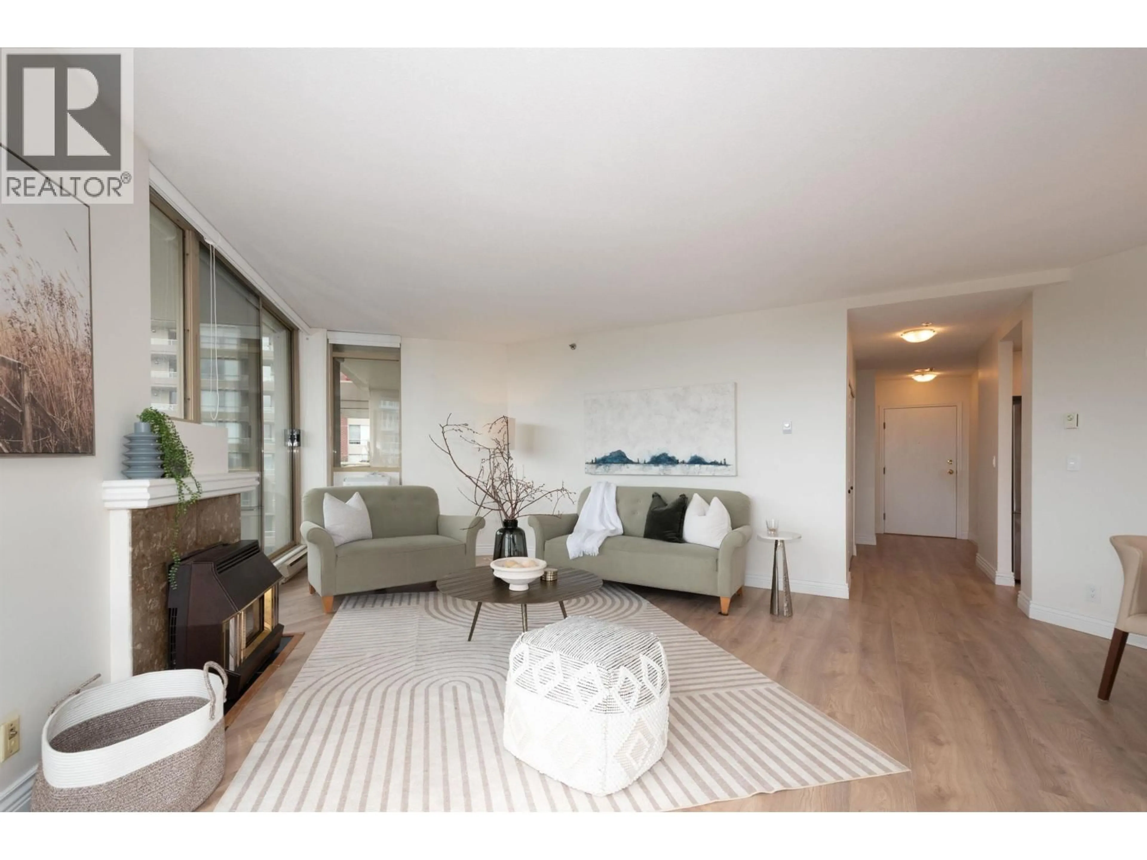 Living room with furniture, wood/laminate floor for 1203 - 728 FARROW STREET, Coquitlam British Columbia V3J3S6