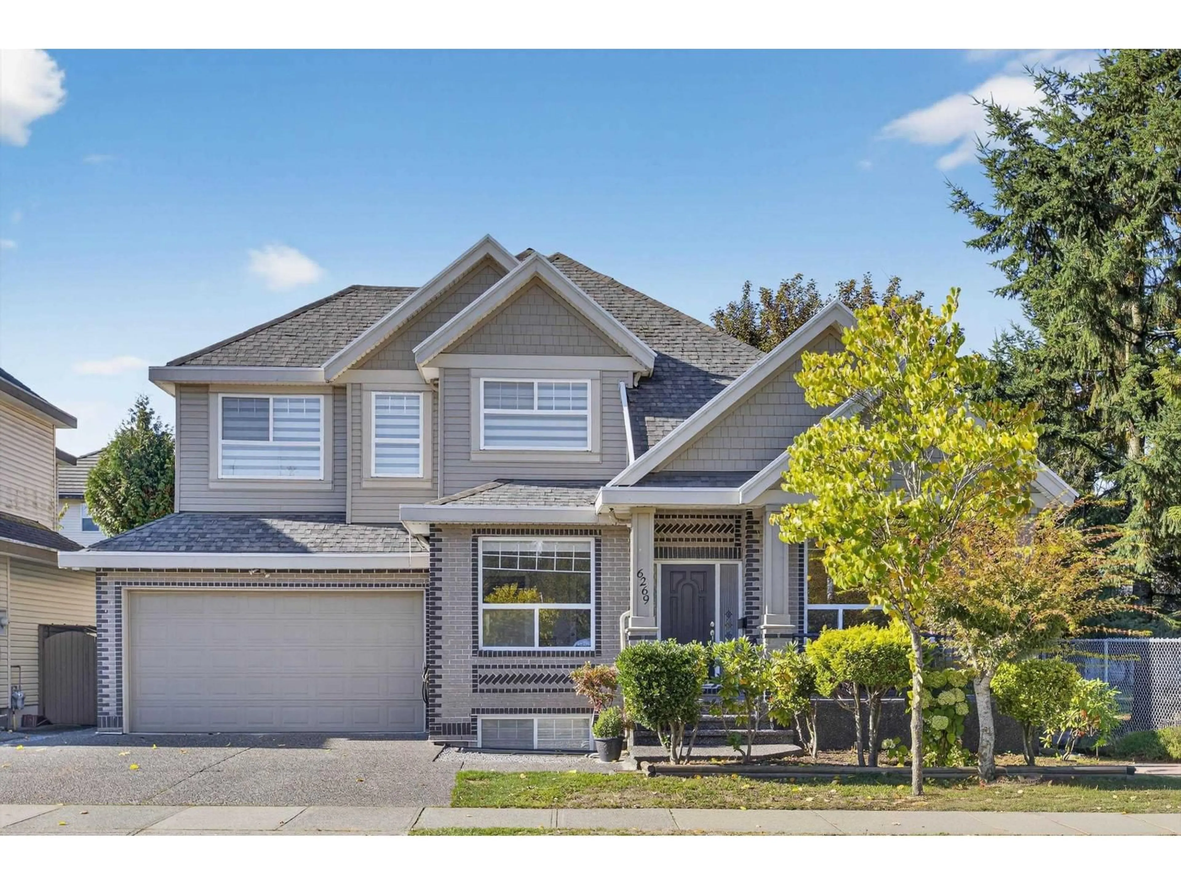 Home with vinyl exterior material, street for 6269 132B, Surrey British Columbia V3X3V4