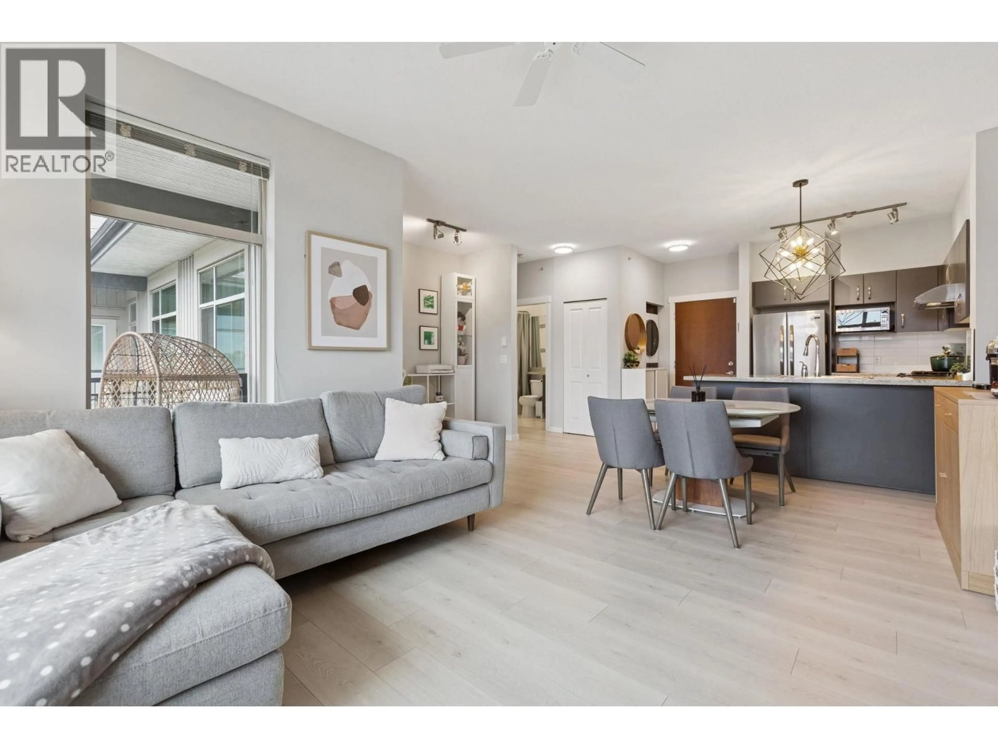 Living room with furniture, unknown for 422 - 9288 ODLIN ROAD, Richmond British Columbia V6X0C3