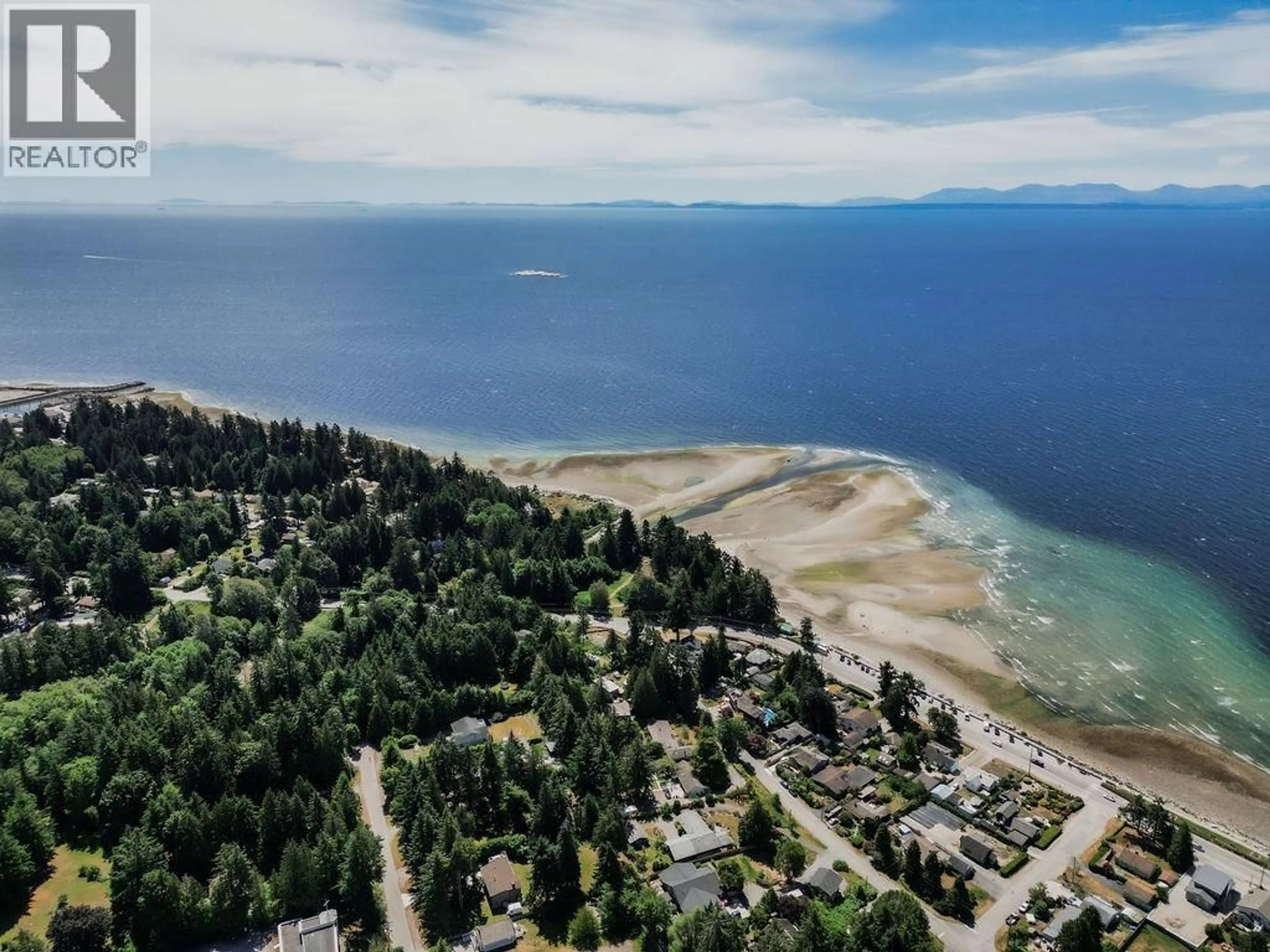 A pic from outside/outdoor area/front of a property/back of a property/a pic from drone, water/lake/river/ocean view for 241 - 5160 DAVIS BAY ROAD, Sechelt British Columbia V7Z0H3
