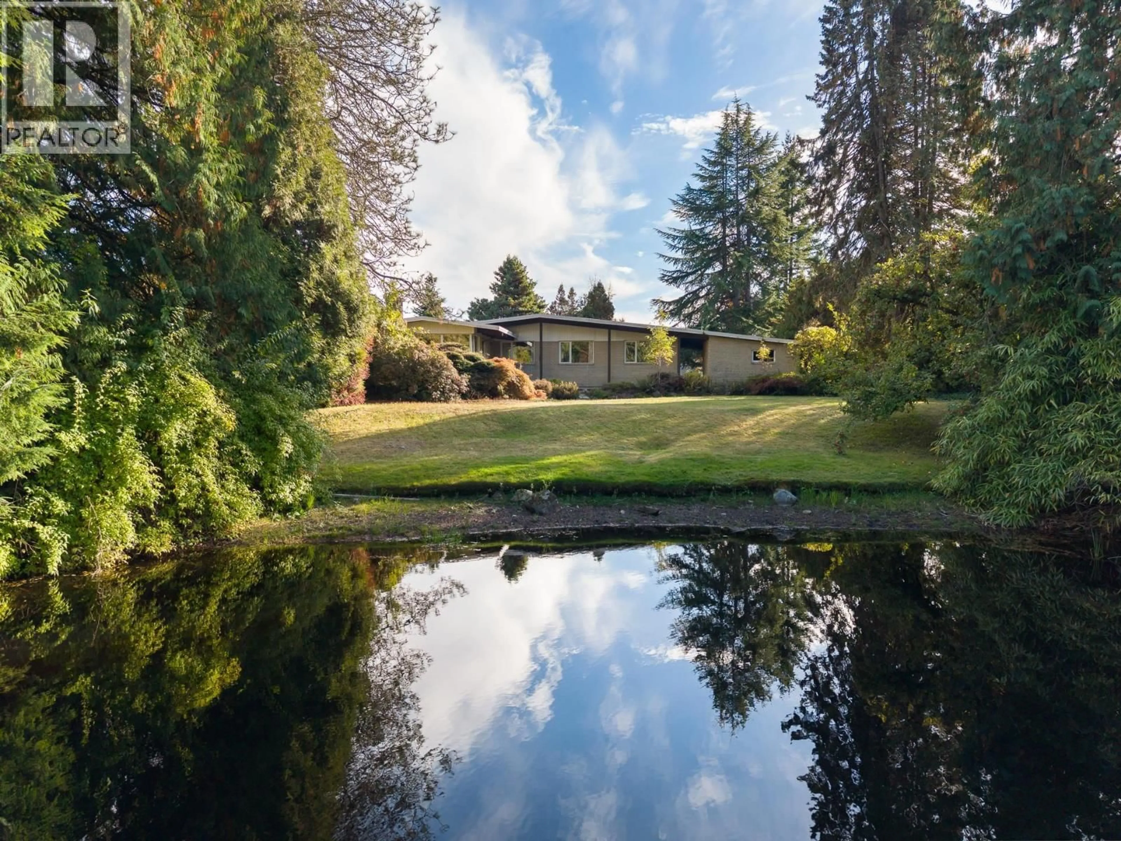 A pic from outside/outdoor area/front of a property/back of a property/a pic from drone, water/lake/river/ocean view for 1025 GROVELAND ROAD, West Vancouver British Columbia V7S1Y9