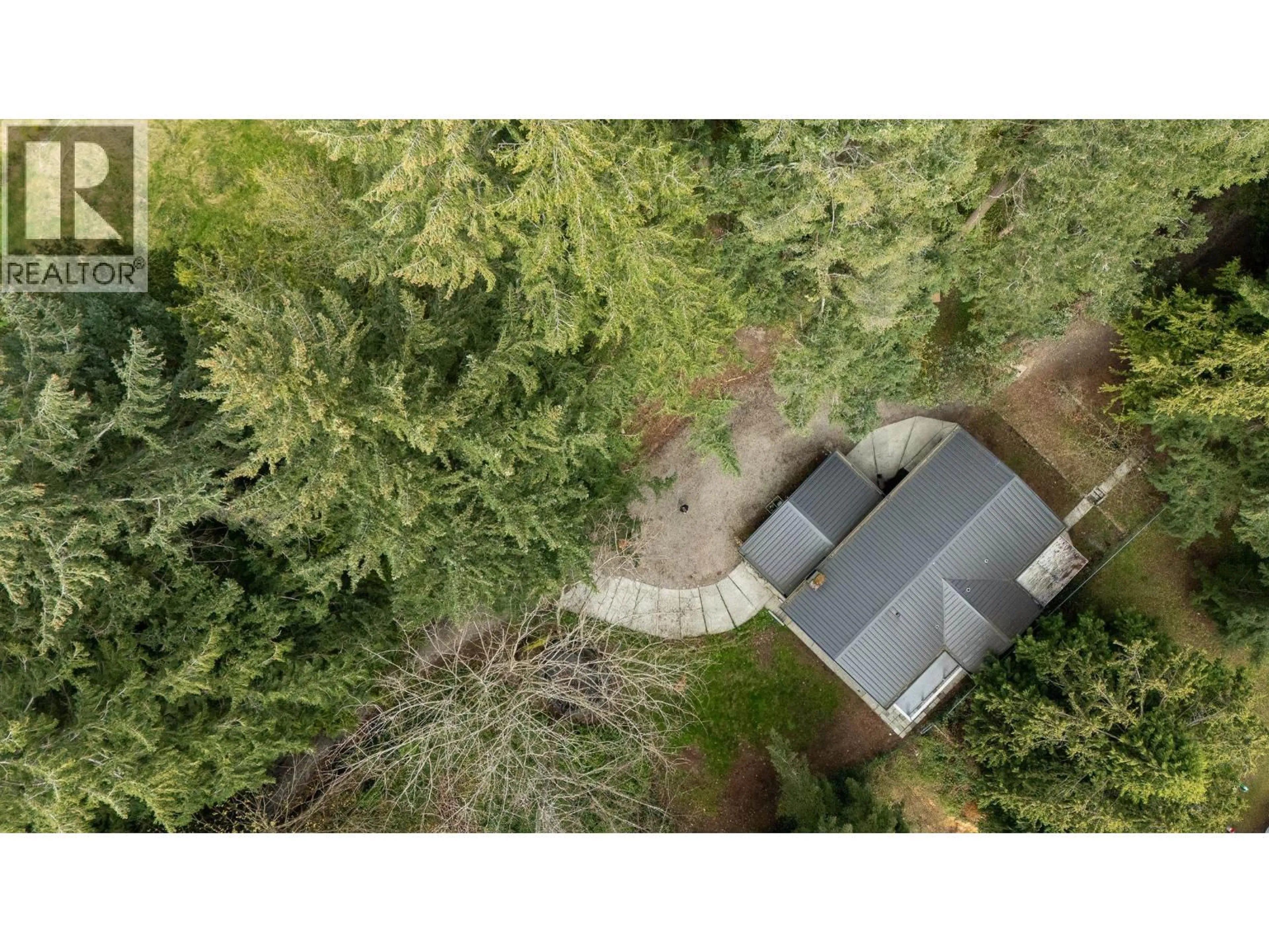 A pic from outside/outdoor area/front of a property/back of a property/a pic from drone, forest/trees view for 5080 SUNSHINE COAST HIGHWAY, Sechelt British Columbia V7Z0G6