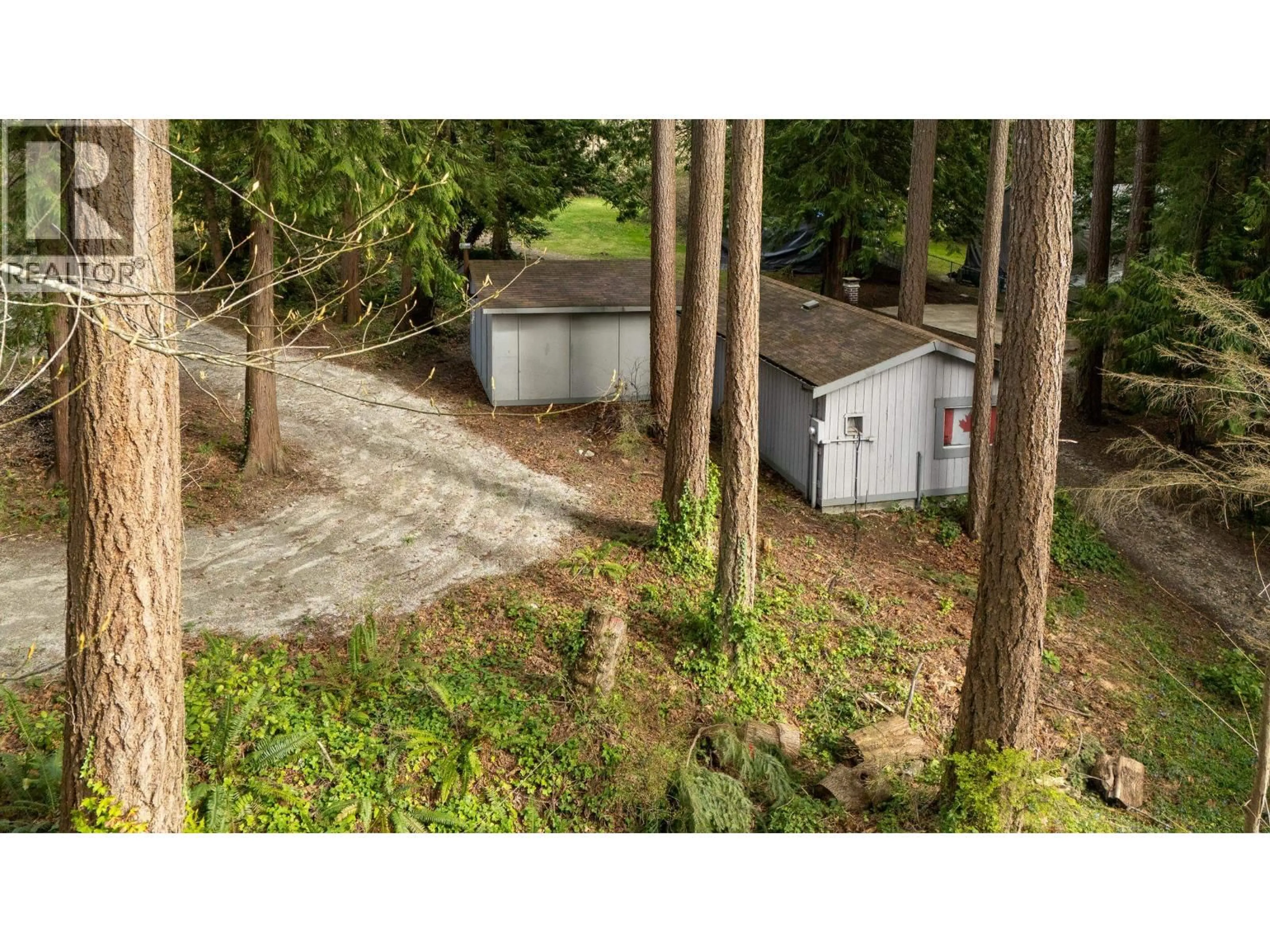 A pic from outside/outdoor area/front of a property/back of a property/a pic from drone, forest/trees view for 5080 SUNSHINE COAST HIGHWAY, Sechelt British Columbia V7Z0G6