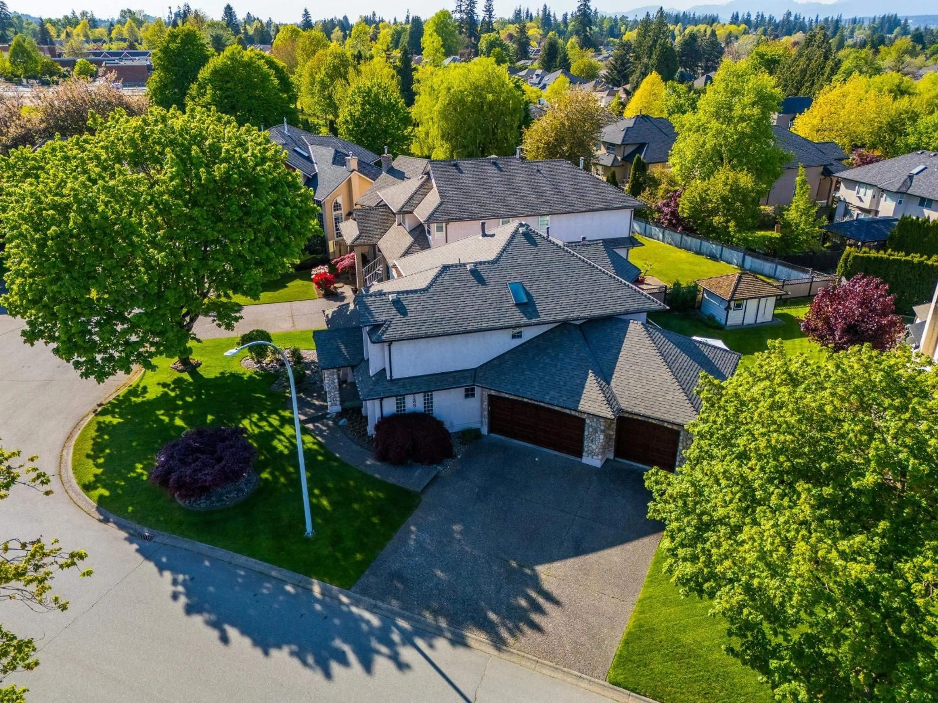 A pic from outside/outdoor area/front of a property/back of a property/a pic from drone, street for 10289 170A, Surrey British Columbia V4N3L1