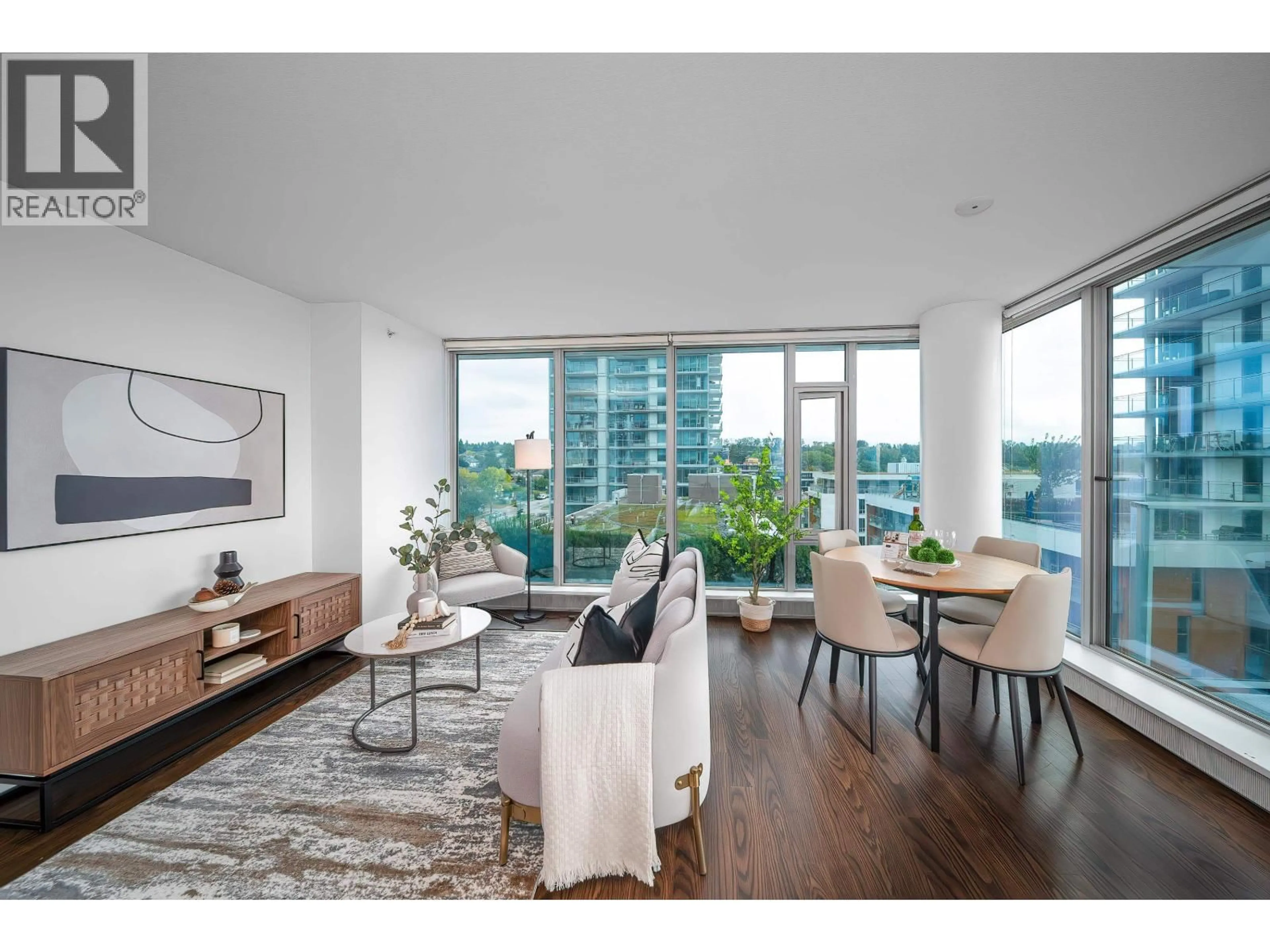 Living room with furniture, wood/laminate floor for 904 - 8131 NUNAVUT LANE, Vancouver British Columbia V5X0E2