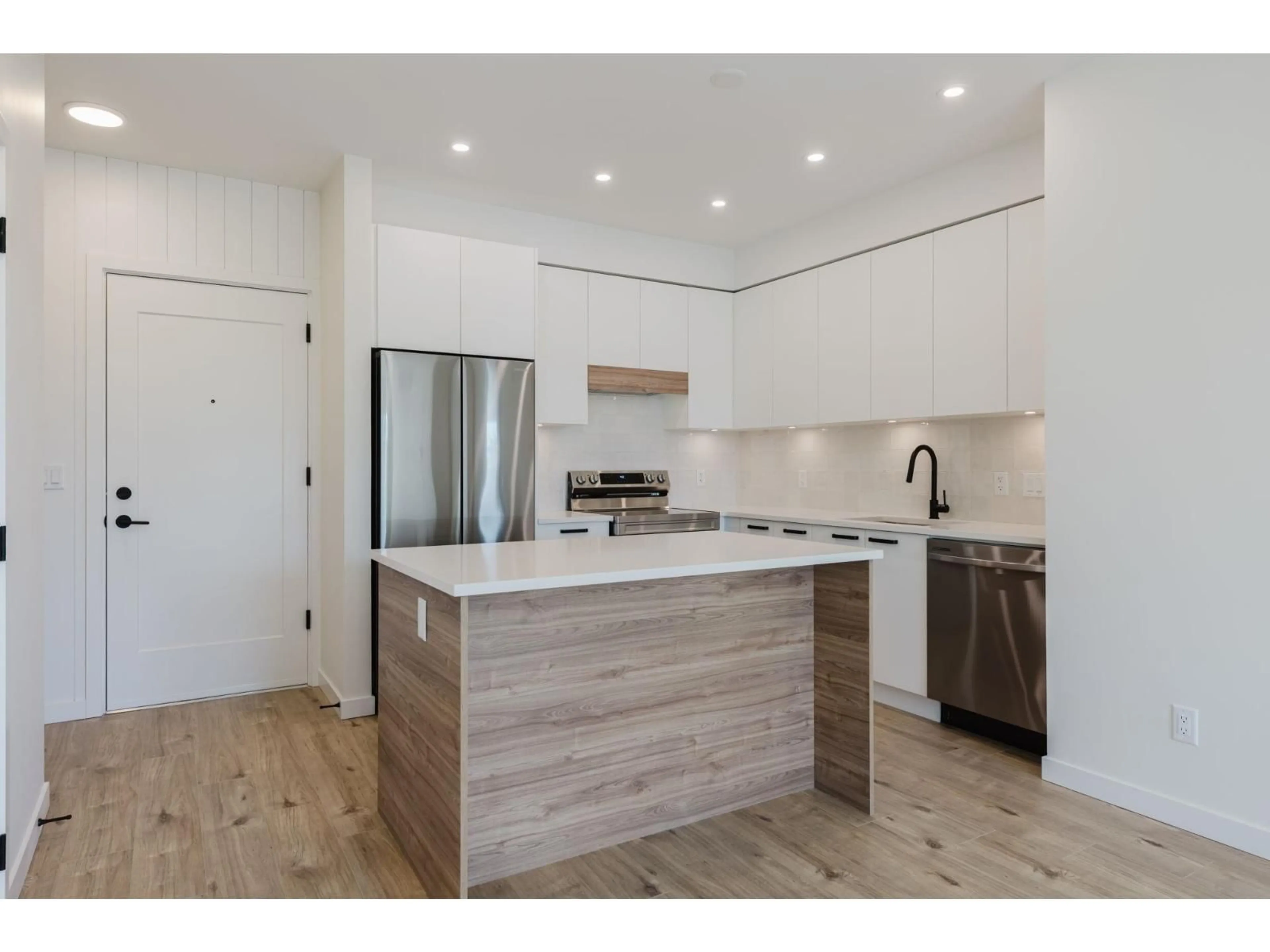 Open concept kitchen, wood/laminate floor for 105 - 33920 BEST, Mission British Columbia V2V0L9