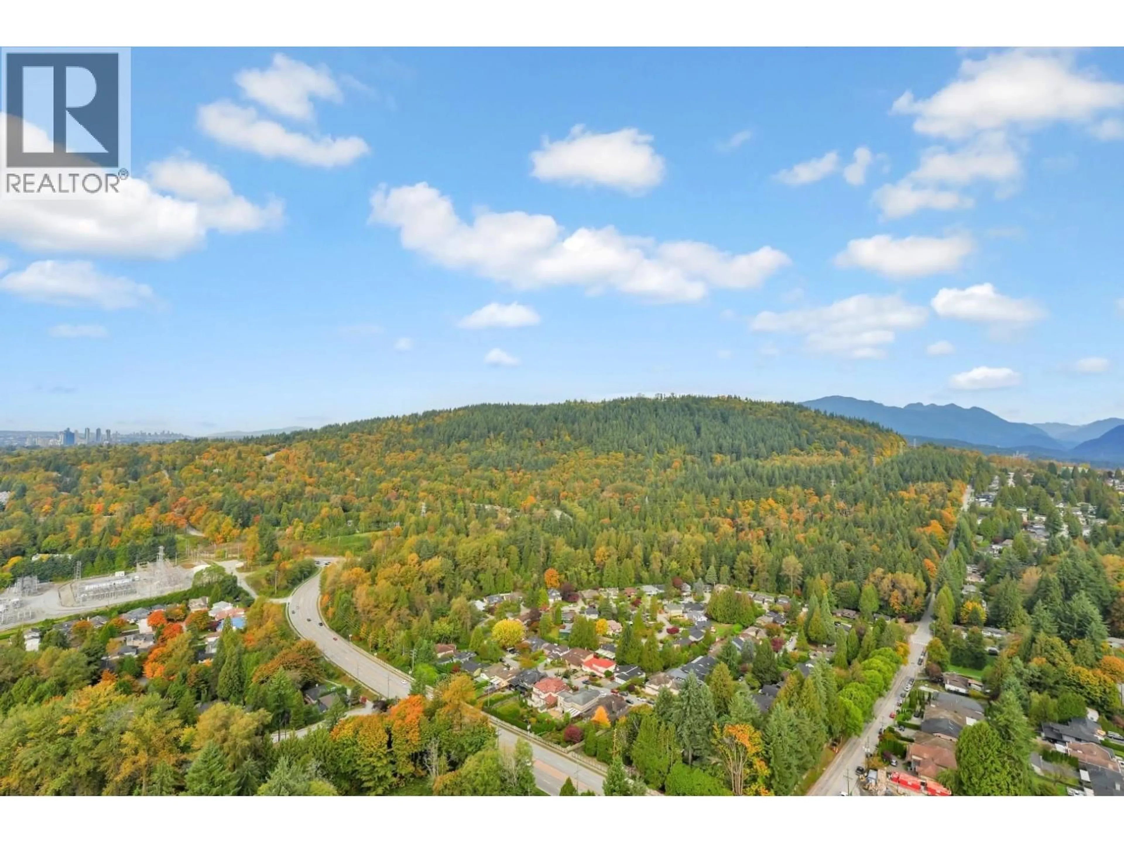 A pic from outside/outdoor area/front of a property/back of a property/a pic from drone, mountain view for 3601 - 720 FARROW STREET, Coquitlam British Columbia V3J0P3