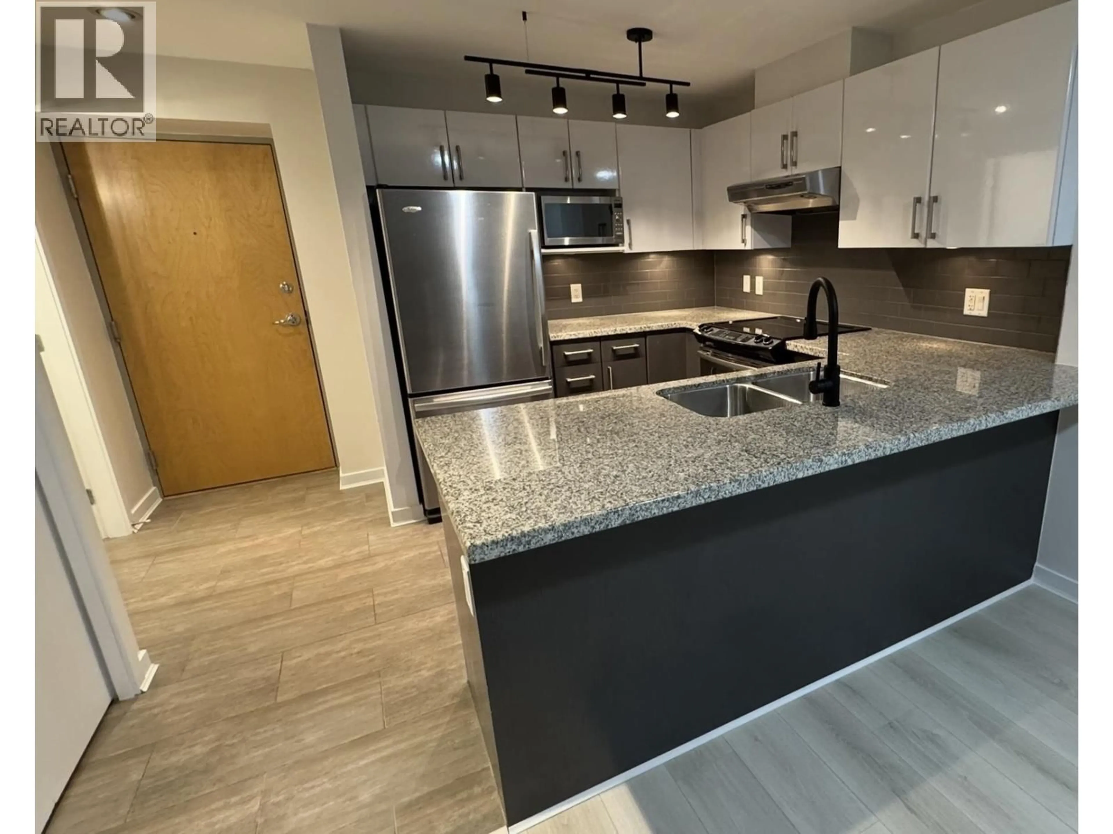 Open concept kitchen, unknown for 907 - 14 BEGBIE STREET, New Westminster British Columbia V3M0C4
