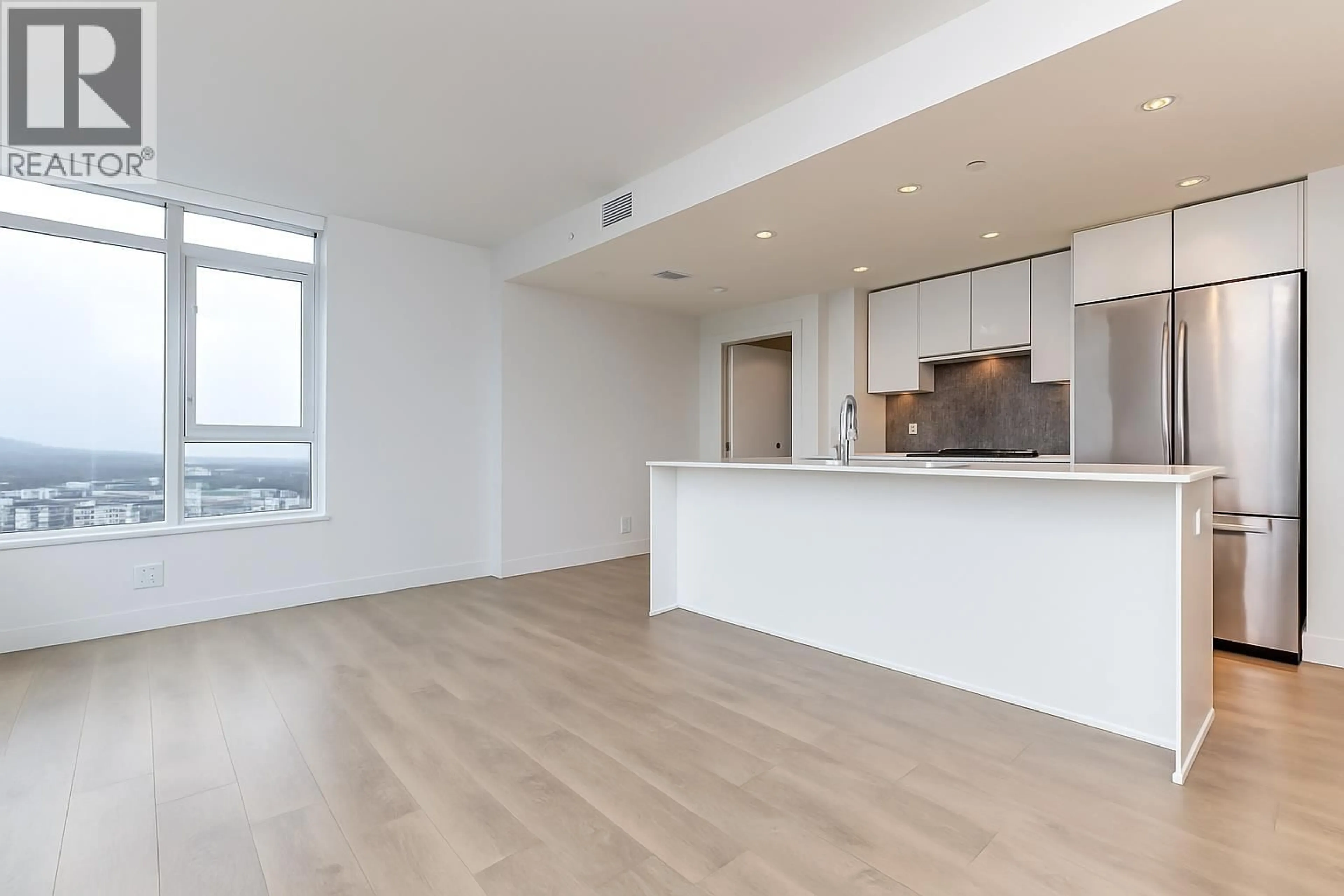 Open concept kitchen, unknown for 1702 - 8538 RIVER DISTRICT CROSSING, Vancouver British Columbia V5S0C9