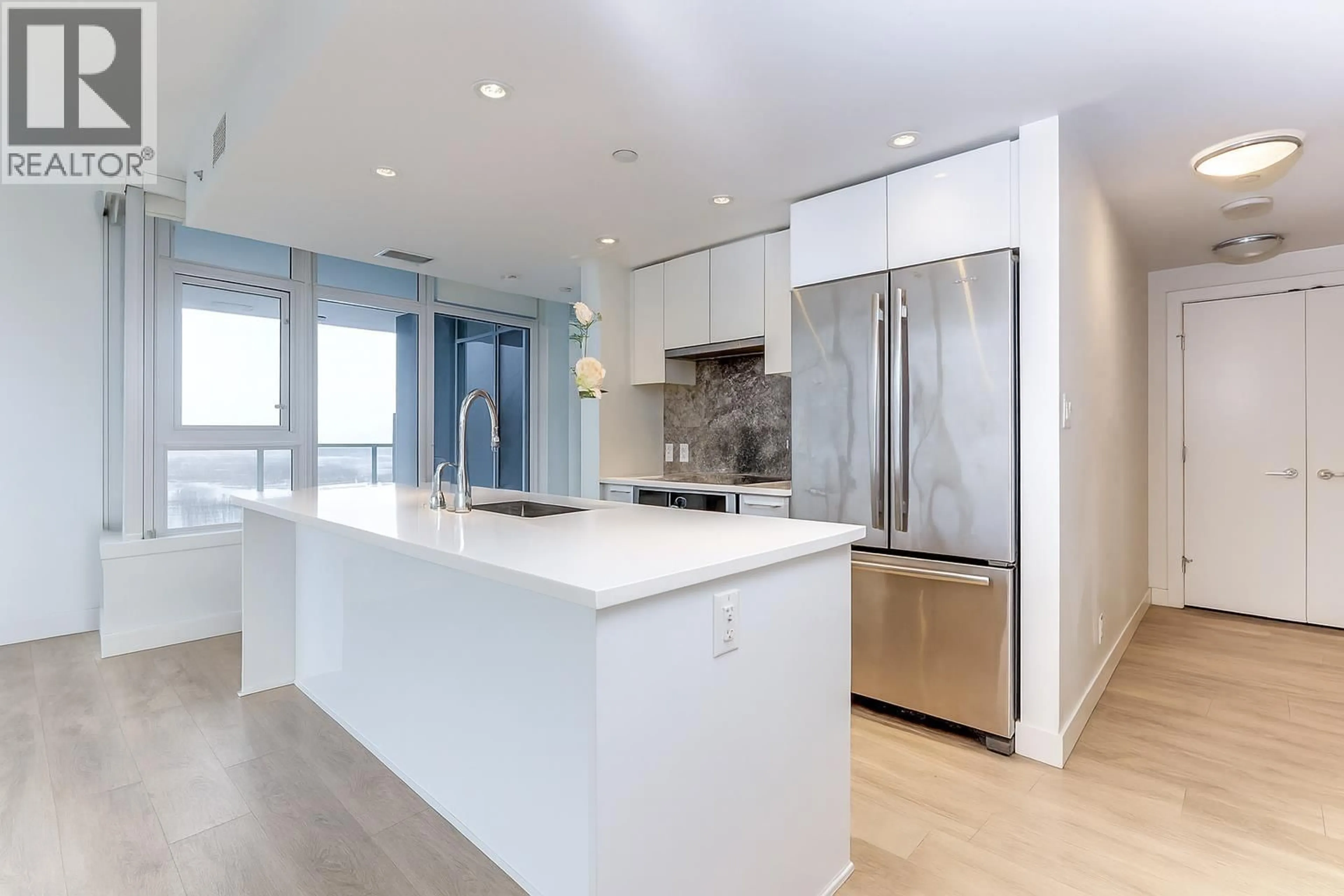 Open concept kitchen, unknown for 1702 - 8538 RIVER DISTRICT CROSSING, Vancouver British Columbia V5S0C9