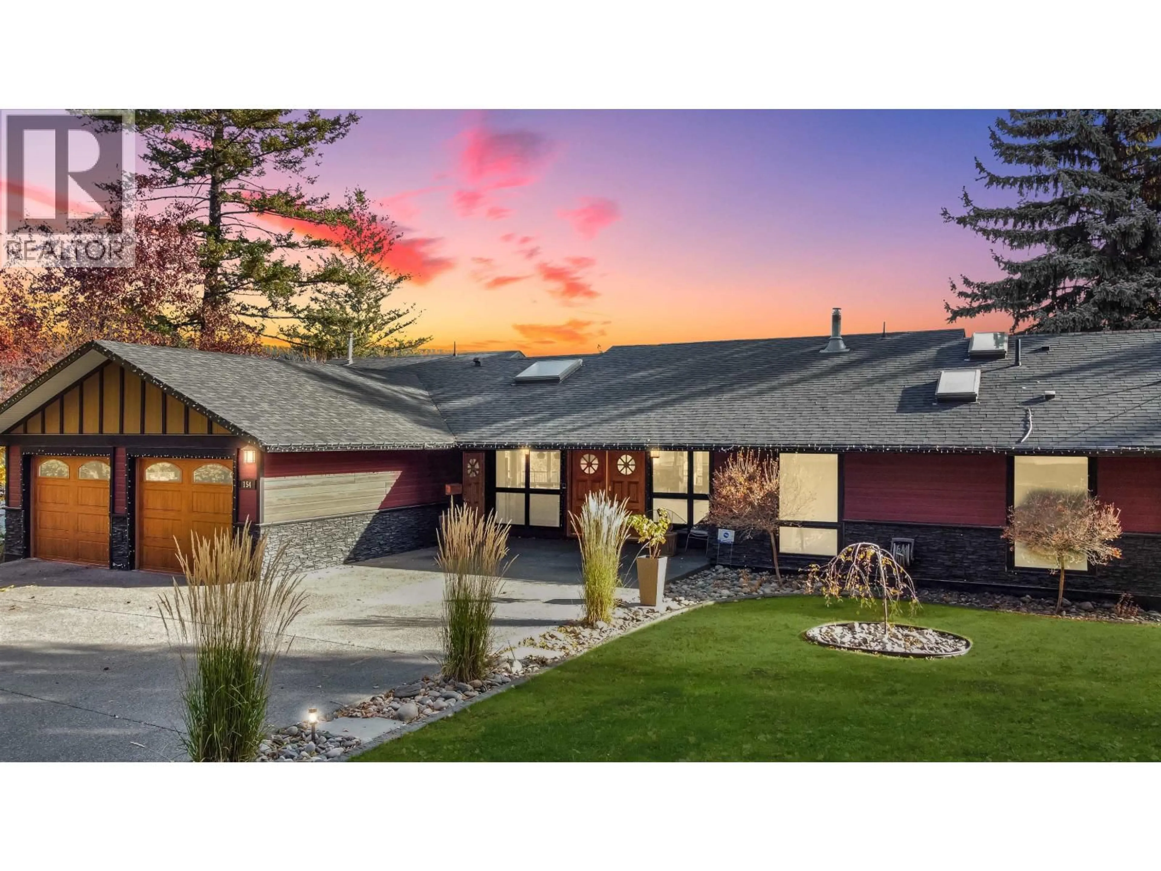 Home with brick exterior material, mountain view for 154 COUNTRY CLUB BOULEVARD, Williams Lake British Columbia V2G3T2
