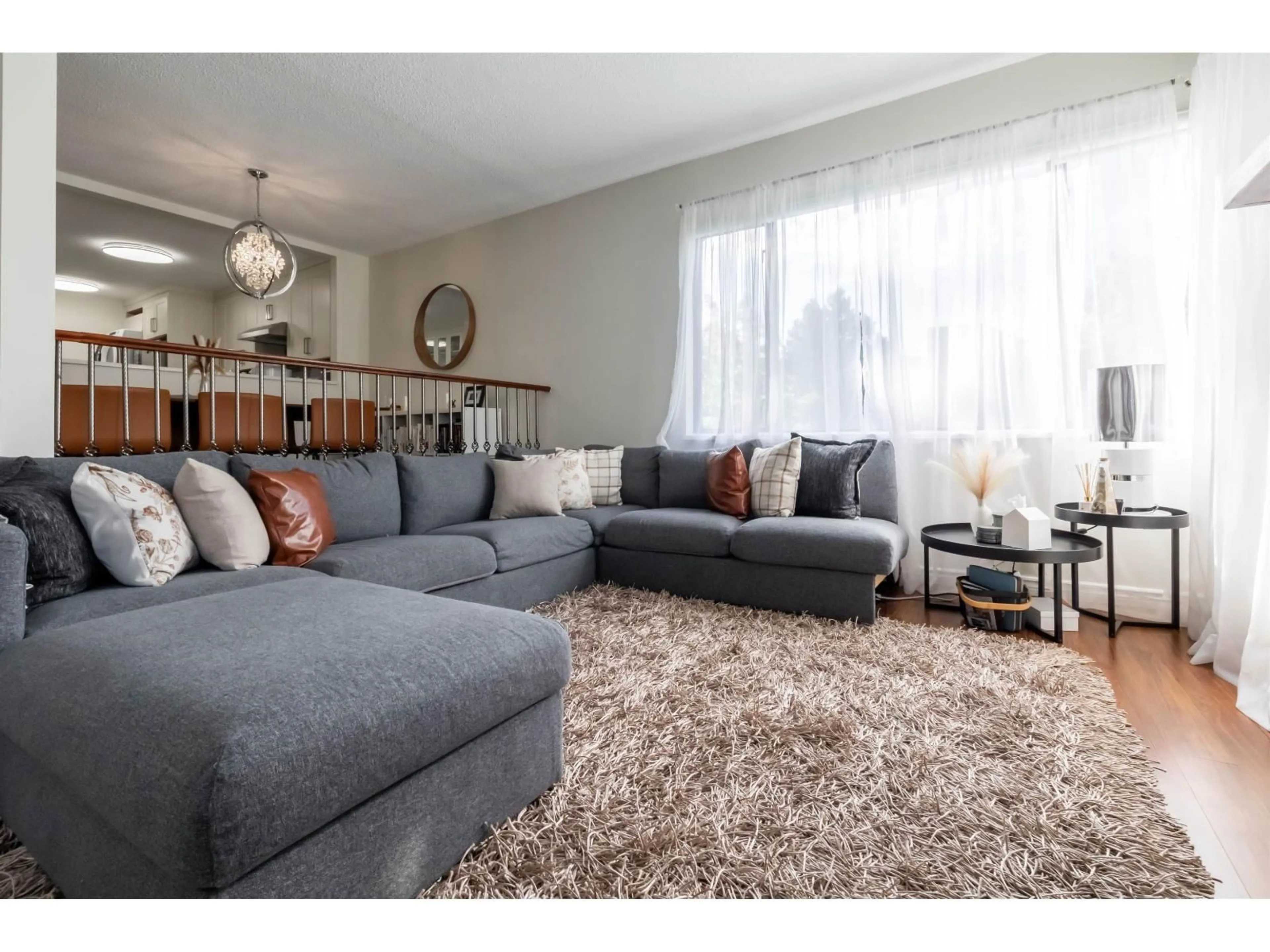 Living room with furniture, carpet floor for 217 - 15275 19, Surrey British Columbia V4A1X6