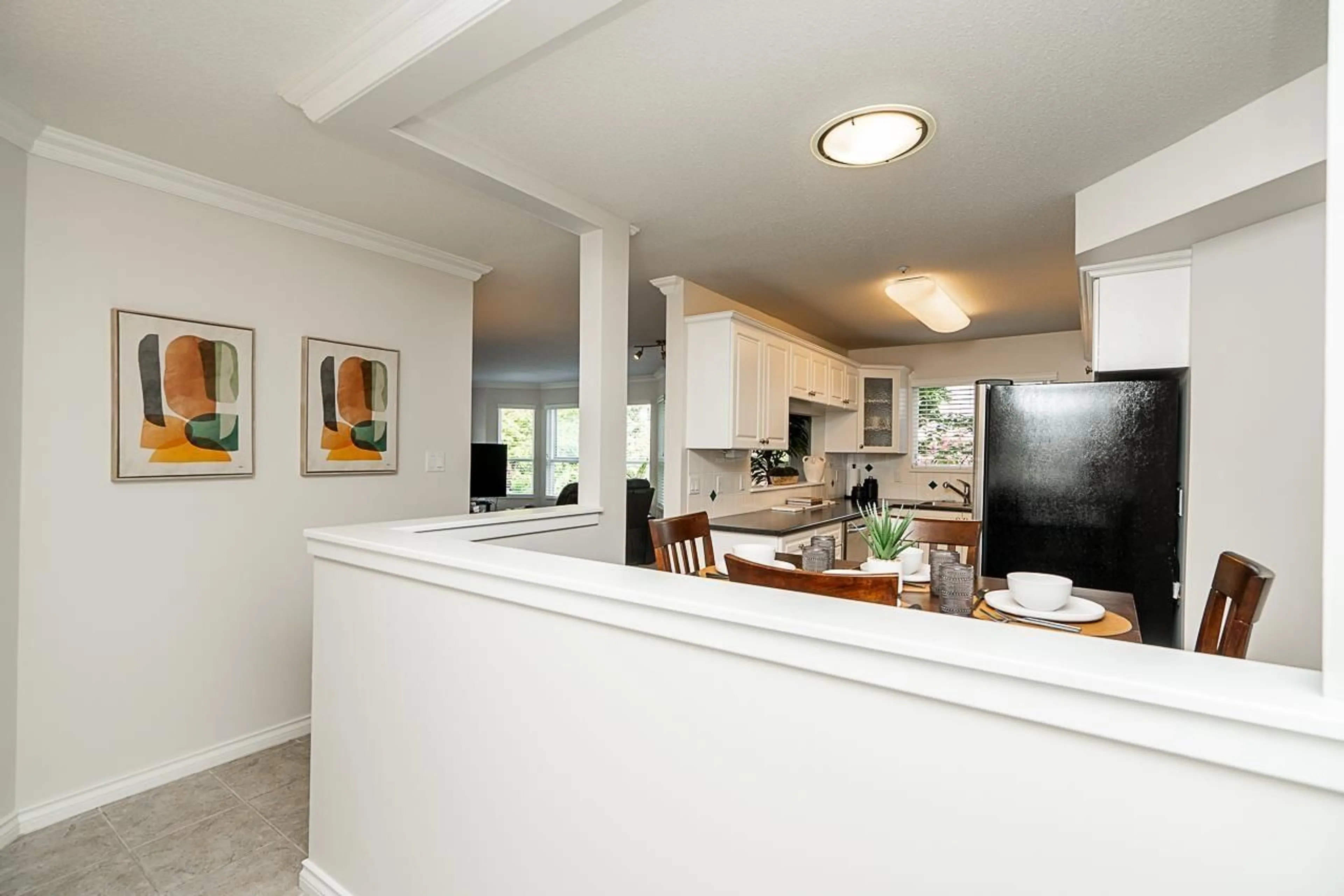 Open concept kitchen, ceramic/tile floor for #212 - 8139 121A, Surrey British Columbia V3Z0K8