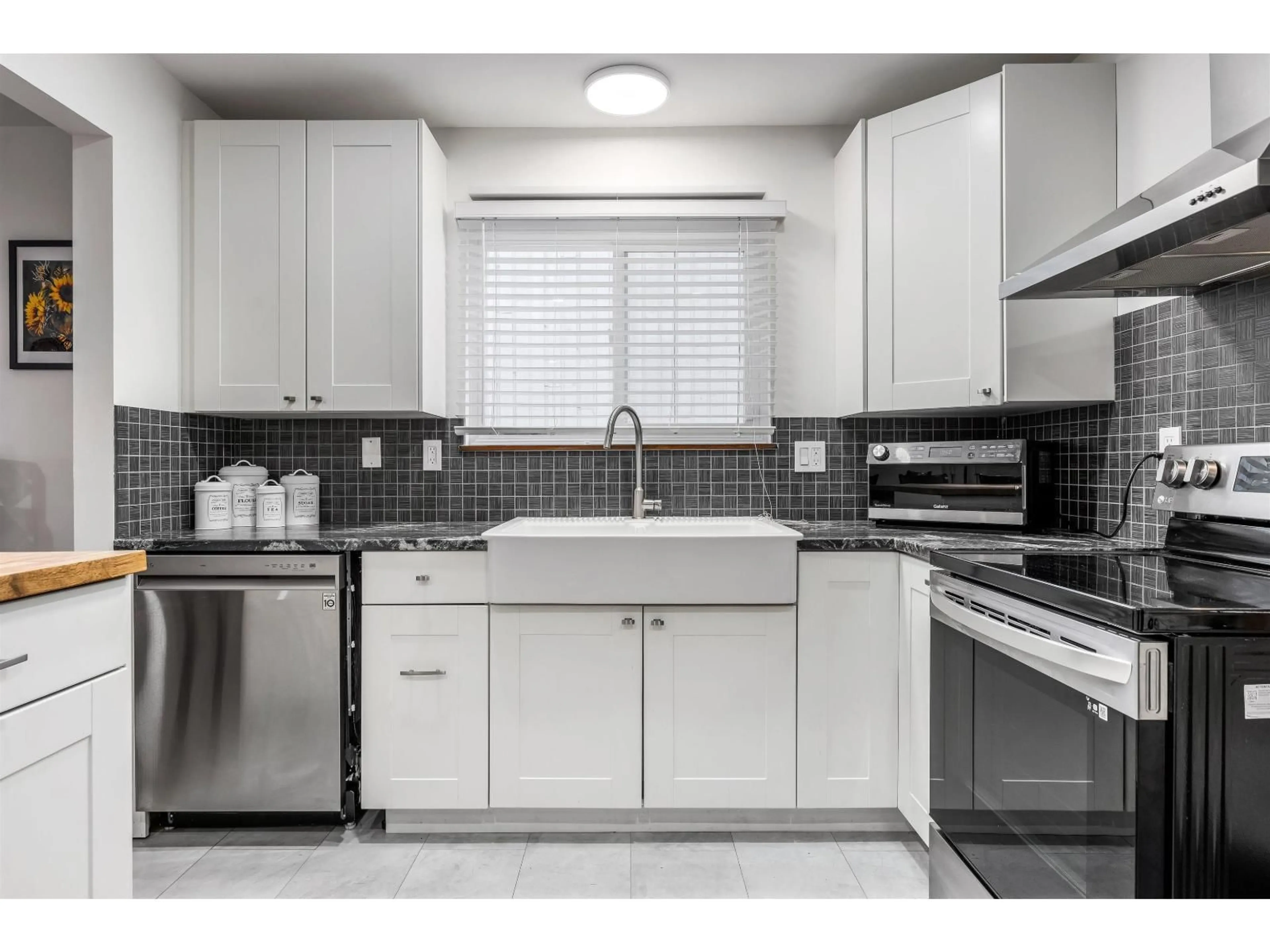 Standard kitchen, ceramic/tile floor for 8542 MCCUTCHEON AVENUE, Chilliwack British Columbia V2P7K7