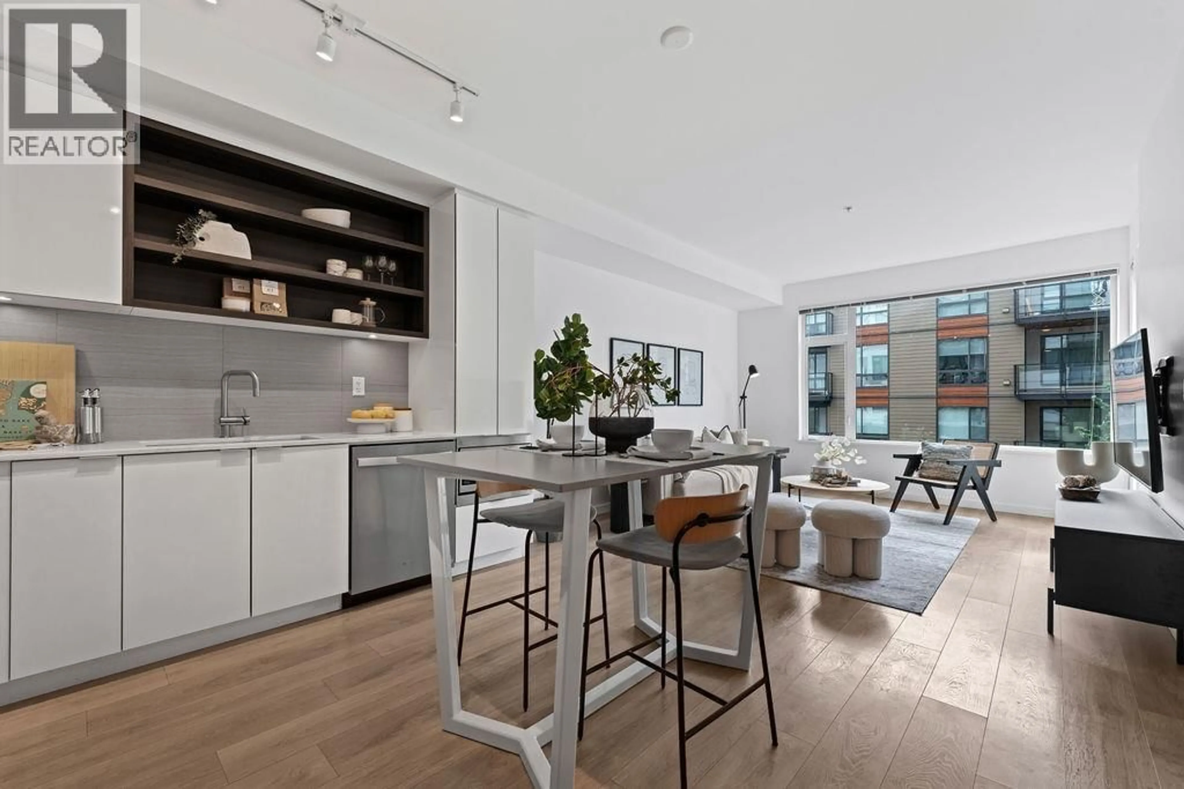 Open concept kitchen, unknown for 206 - 725 MARINE DRIVE, North Vancouver British Columbia V7M0G2