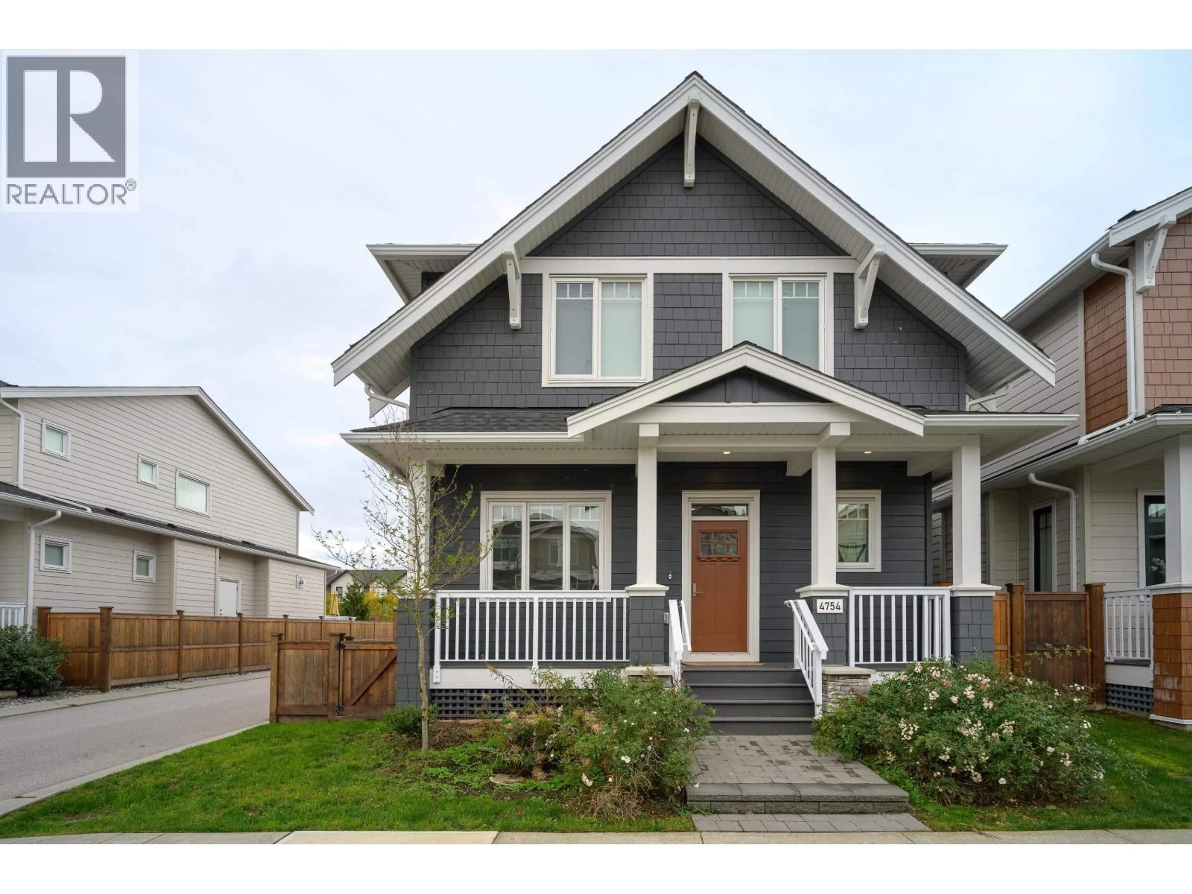 Home with vinyl exterior material, street for 4754 HAZELNUT WAY, Tsawwassen British Columbia V4M0C5