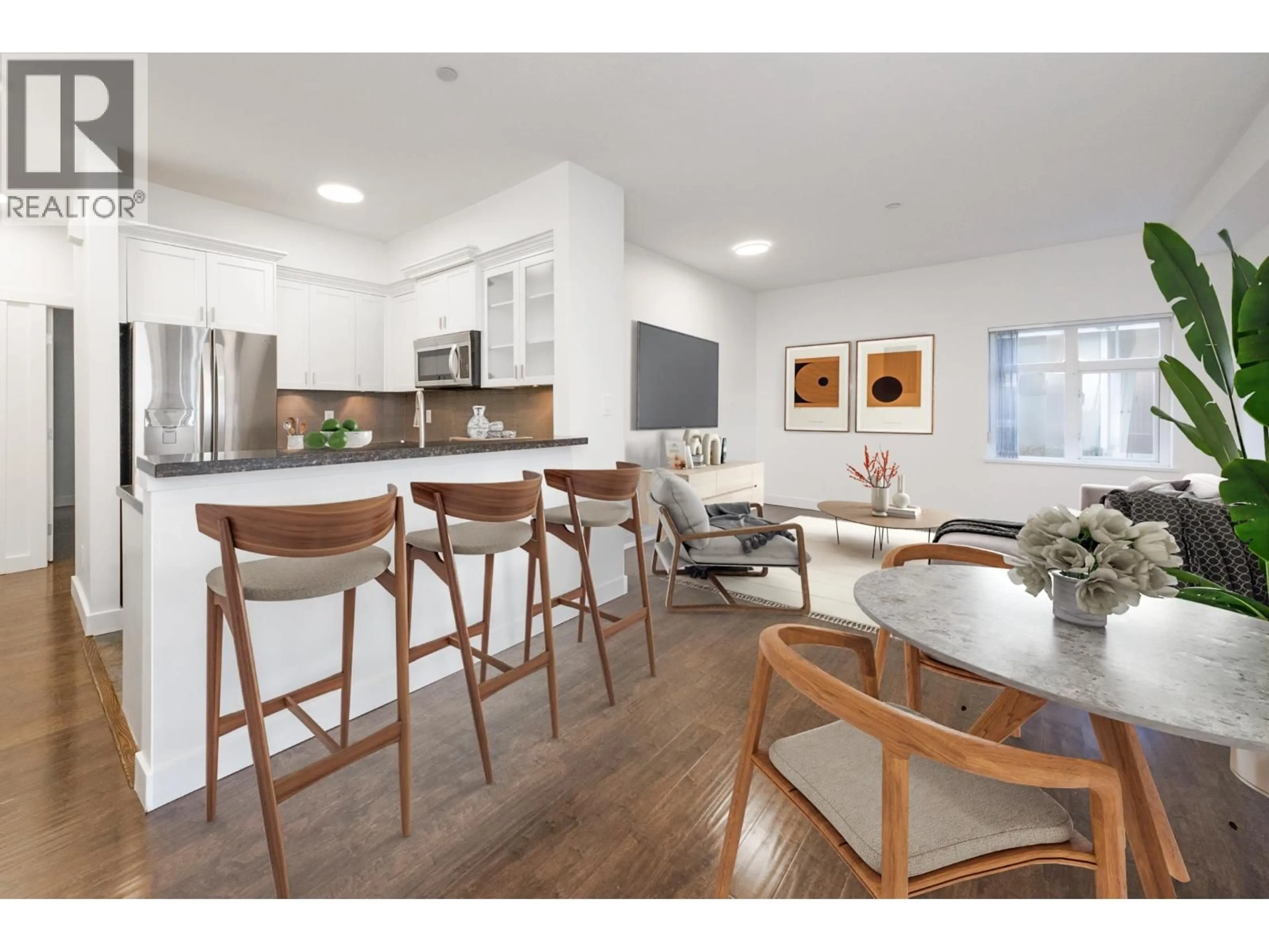 Open concept kitchen, wood/laminate floor for 132 - 7388 MACPHERSON AVENUE, Burnaby British Columbia V5J0A1