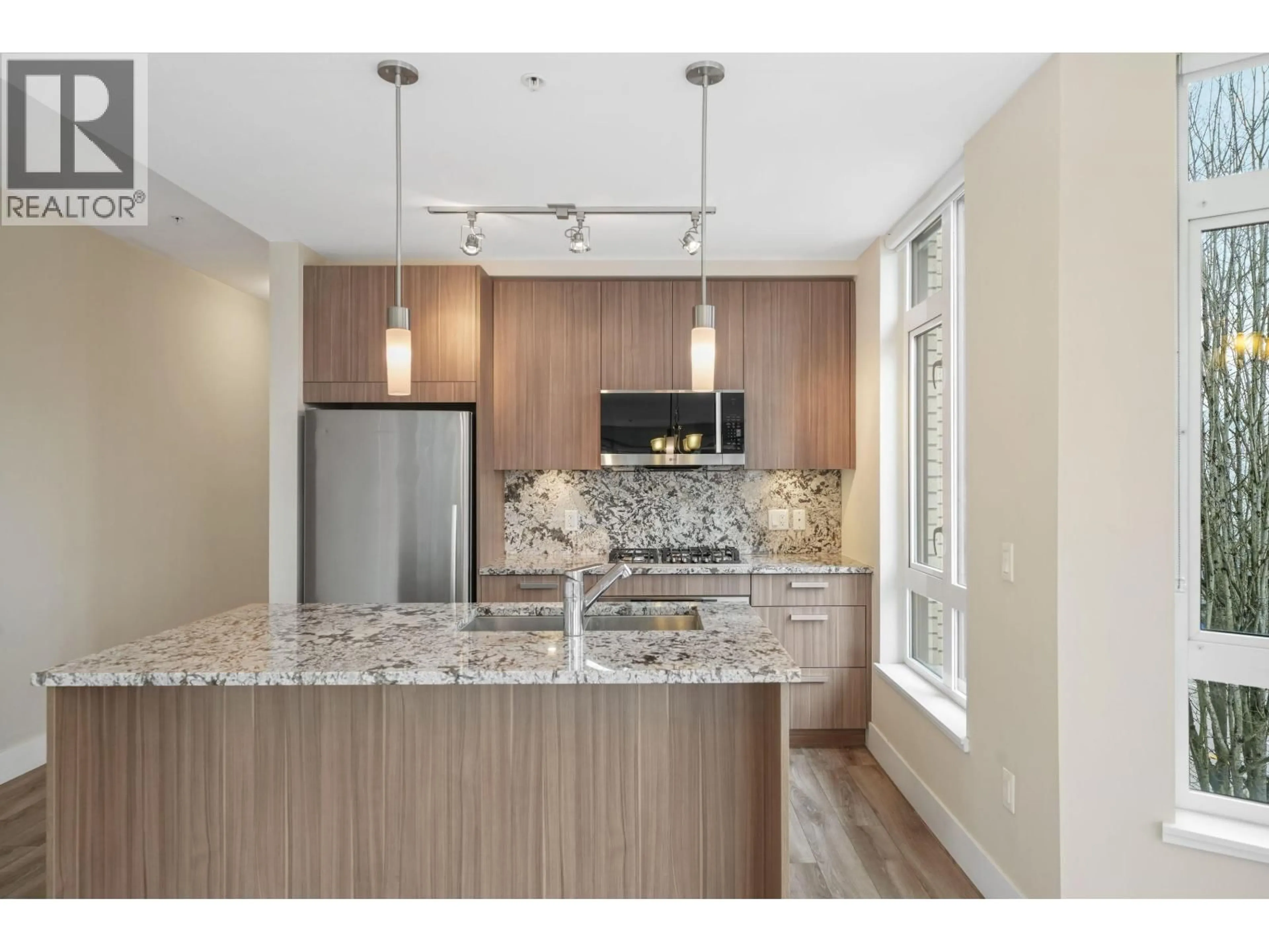 Open concept kitchen, unknown for 306 - 4307 HASTINGS STREET, Burnaby British Columbia V5C2J7