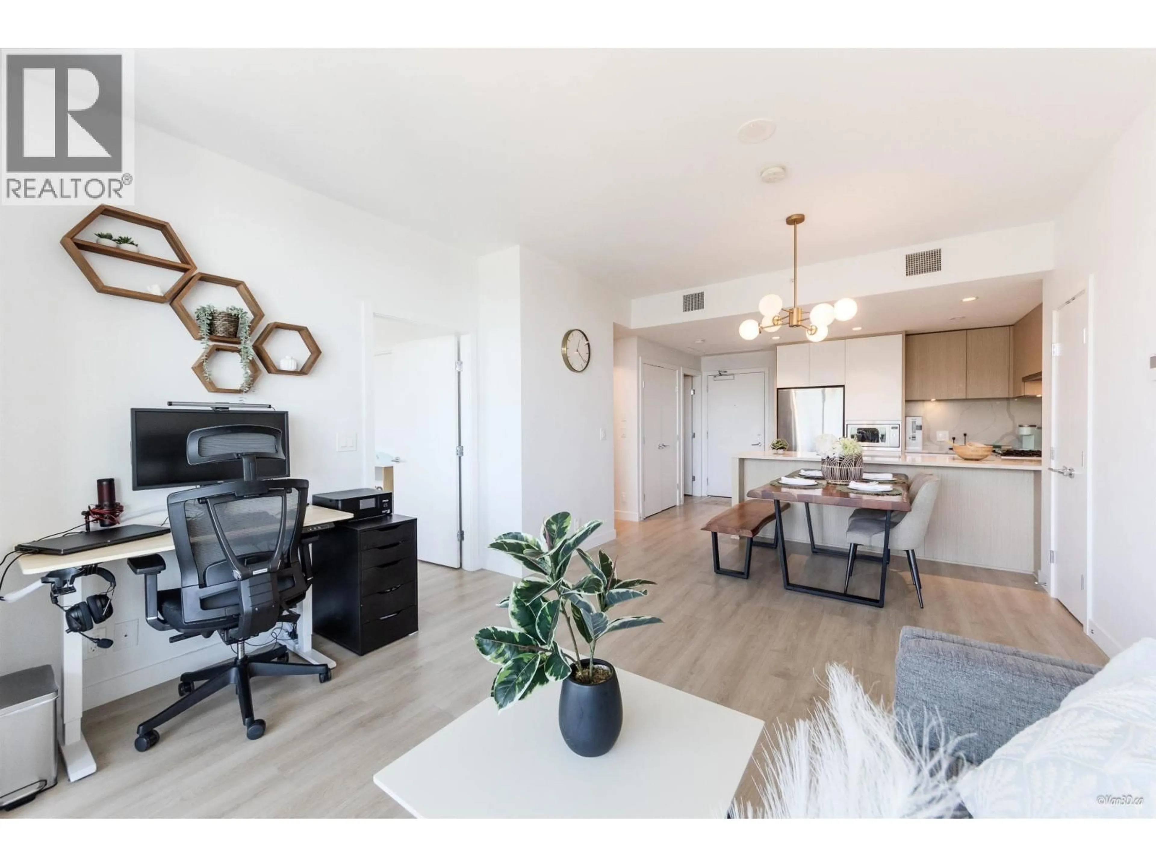 Living room with furniture, wood/laminate floor for 2703 - 567 CLARKE ROAD, Coquitlam British Columbia V3J0K7