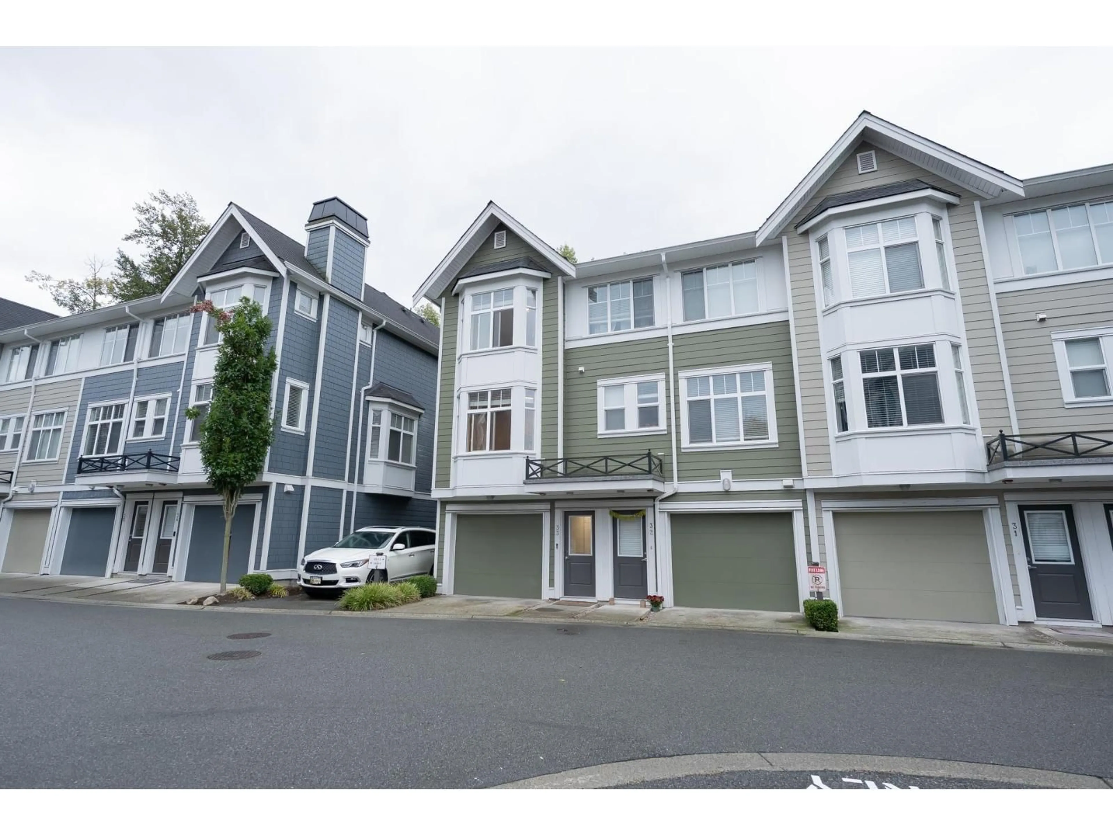 A pic from outside/outdoor area/front of a property/back of a property/a pic from drone, street for 33 - 20852 77A, Langley British Columbia V2Y0R8