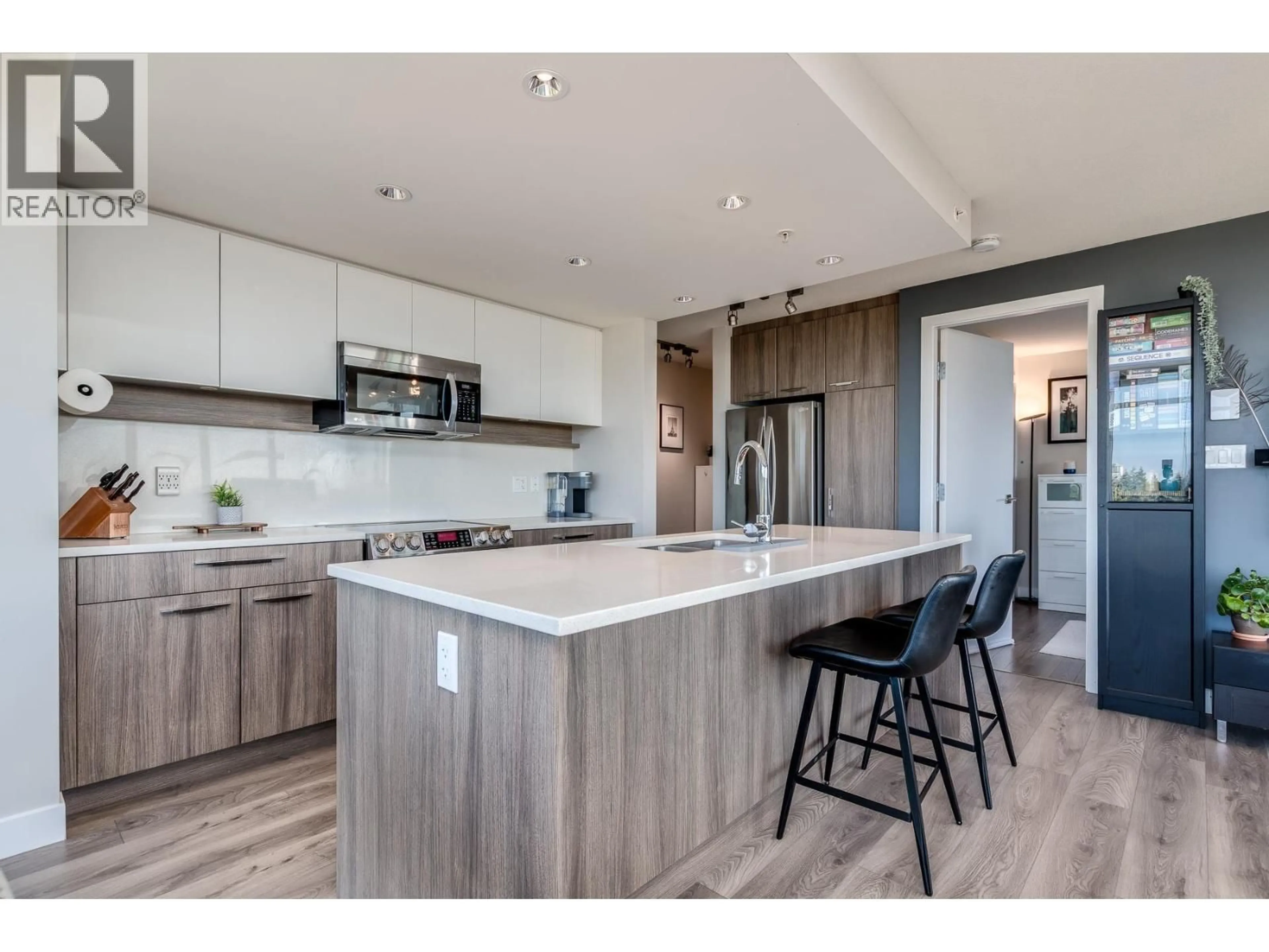 Open concept kitchen, wood/laminate floor for 1202 - 958 RIDGEWAY AVENUE, Coquitlam British Columbia V3K0C5