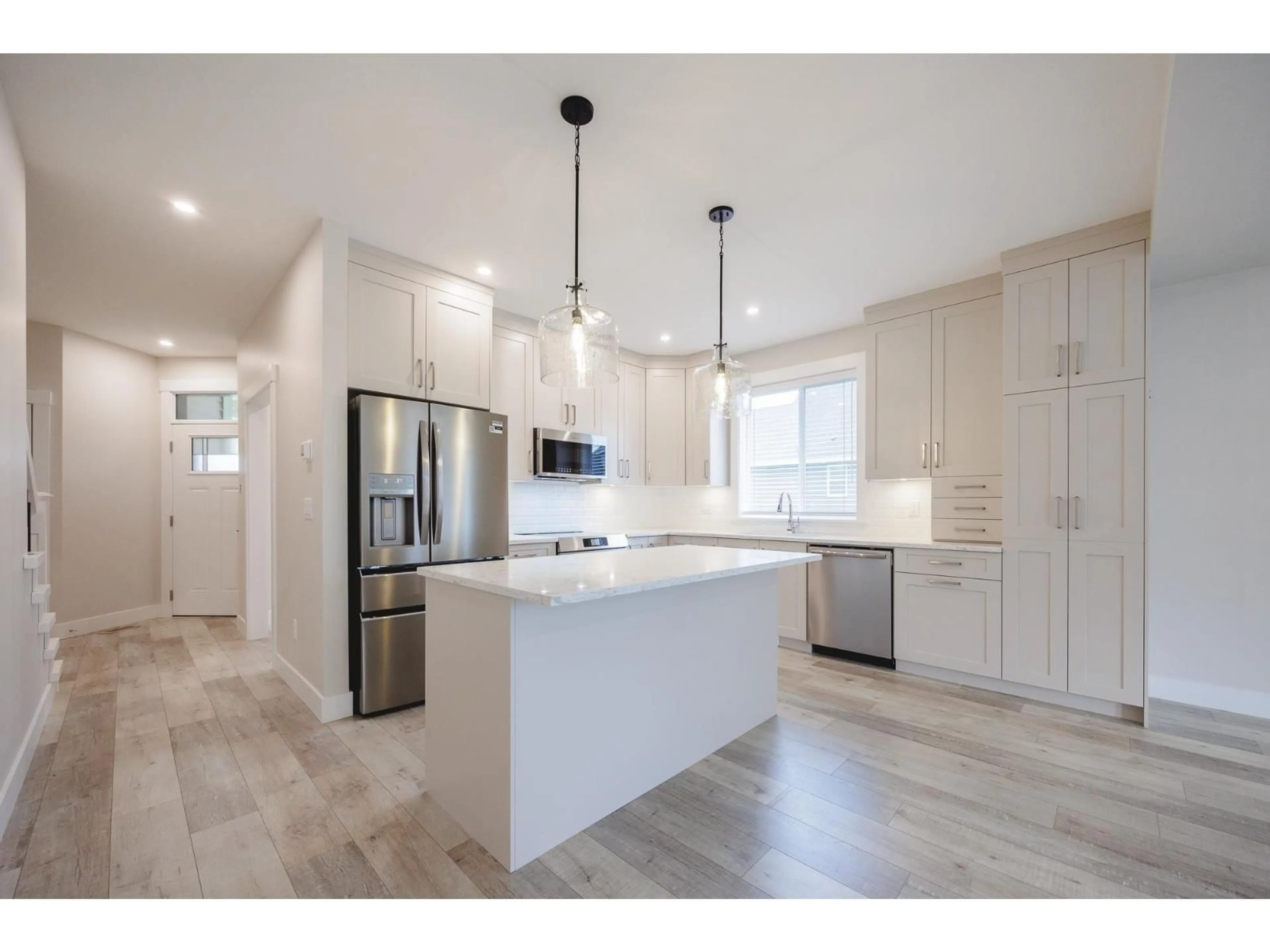 Open concept kitchen, unknown for 103 - 6211 CHILLIWACK RIVER ROAD, Chilliwack British Columbia V2R6A7