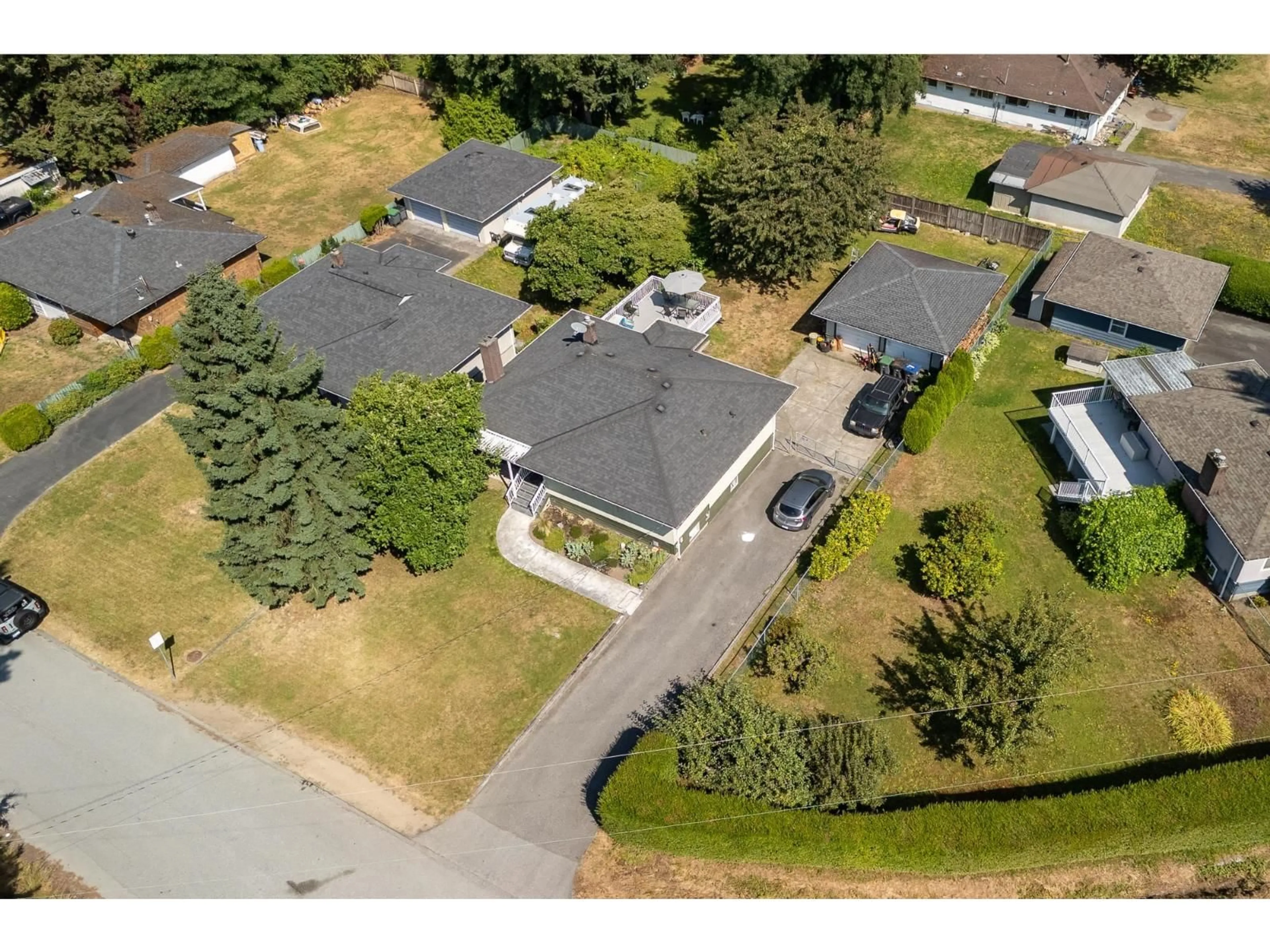 A pic from outside/outdoor area/front of a property/back of a property/a pic from drone, street for 13759 111, Surrey British Columbia V3R2C1