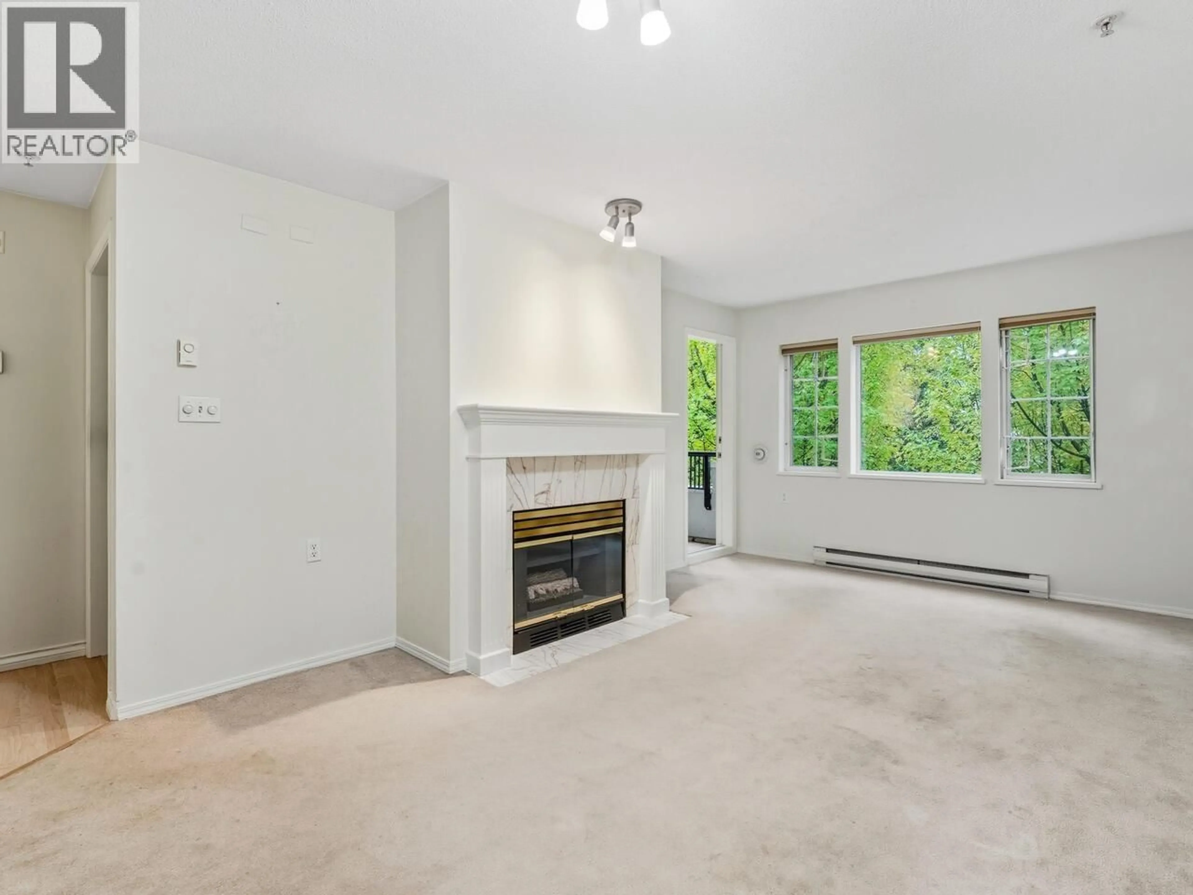 Living room with furniture, unknown for 303 - 55 BLACKBERRY DRIVE, New Westminster British Columbia V3L5S7