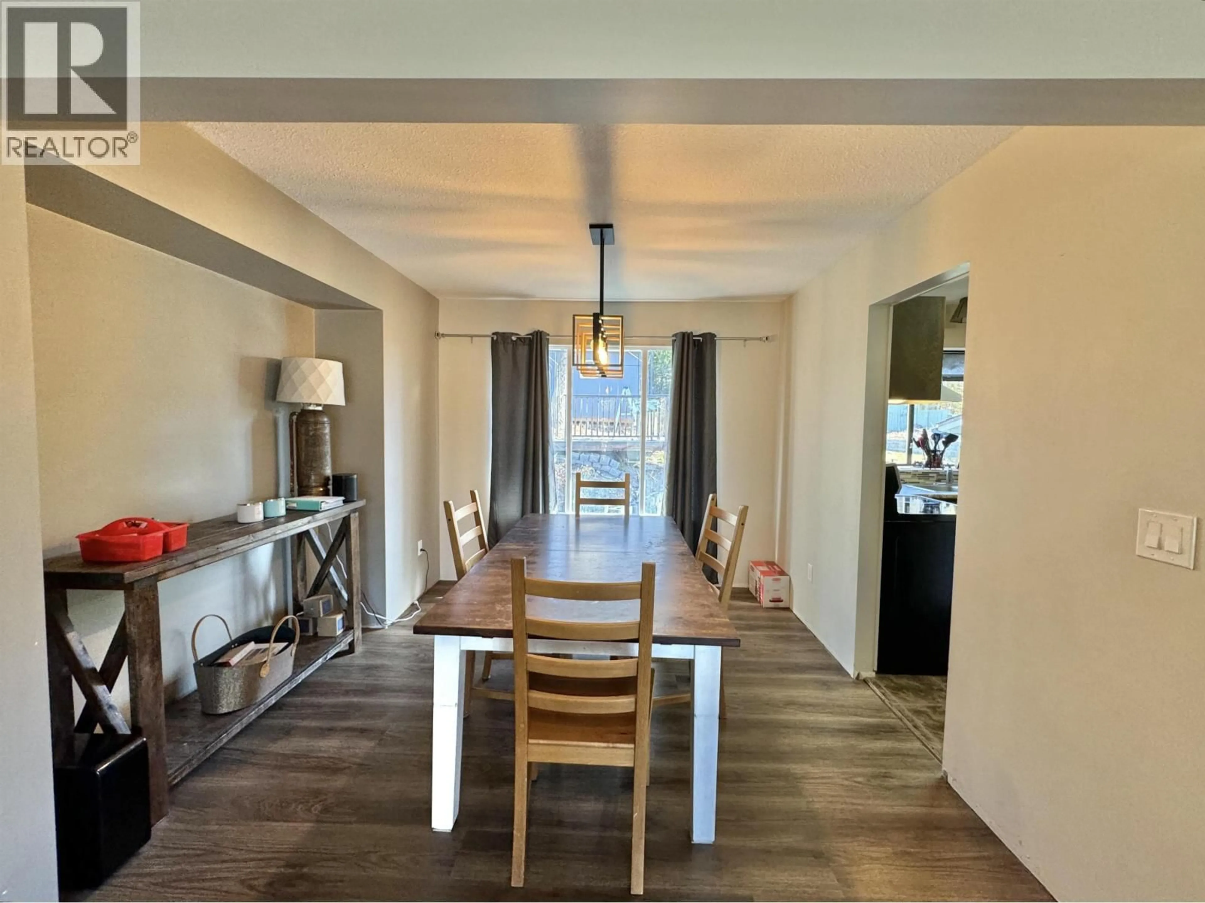 Dining room, wood/laminate floor for 1500 TWELFTH AVENUE, Williams Lake British Columbia V2G3X4