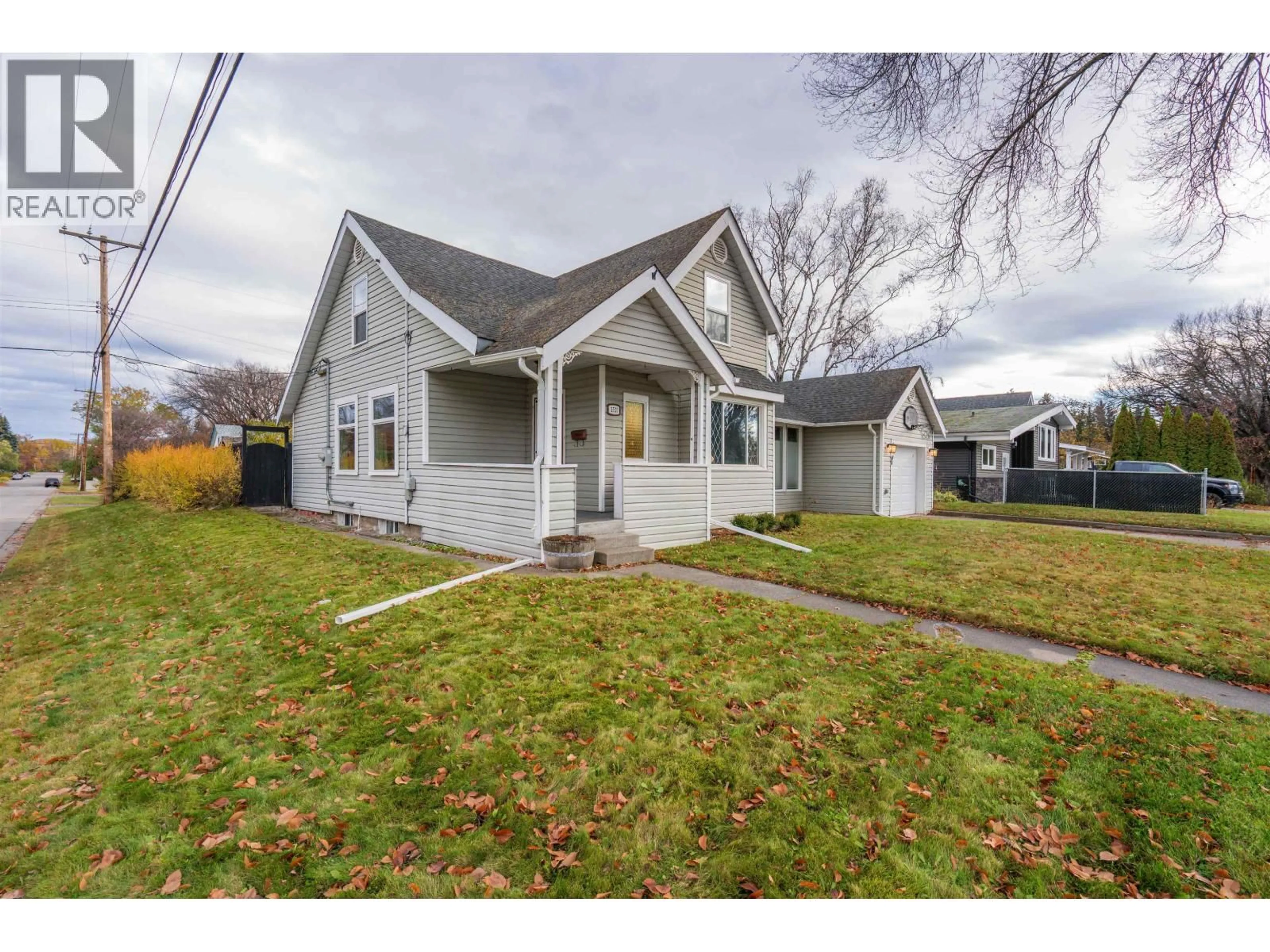 Home with vinyl exterior material, street for 1510 FIR STREET, Prince George British Columbia V2L1E4