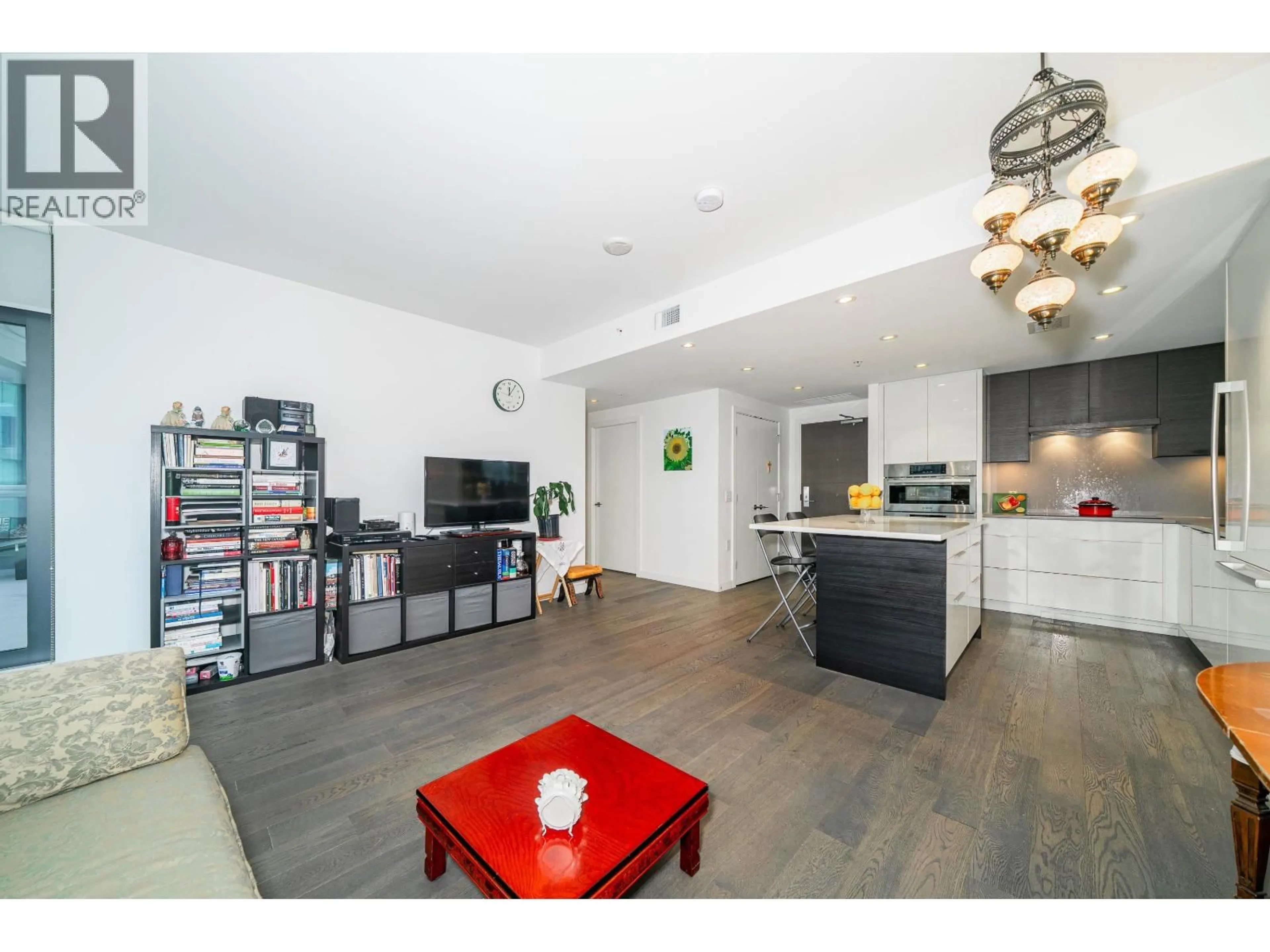 Open concept kitchen, wood/laminate floor for 404 - 1688 PULLMAN PORTER STREET, Vancouver British Columbia V6A0H4