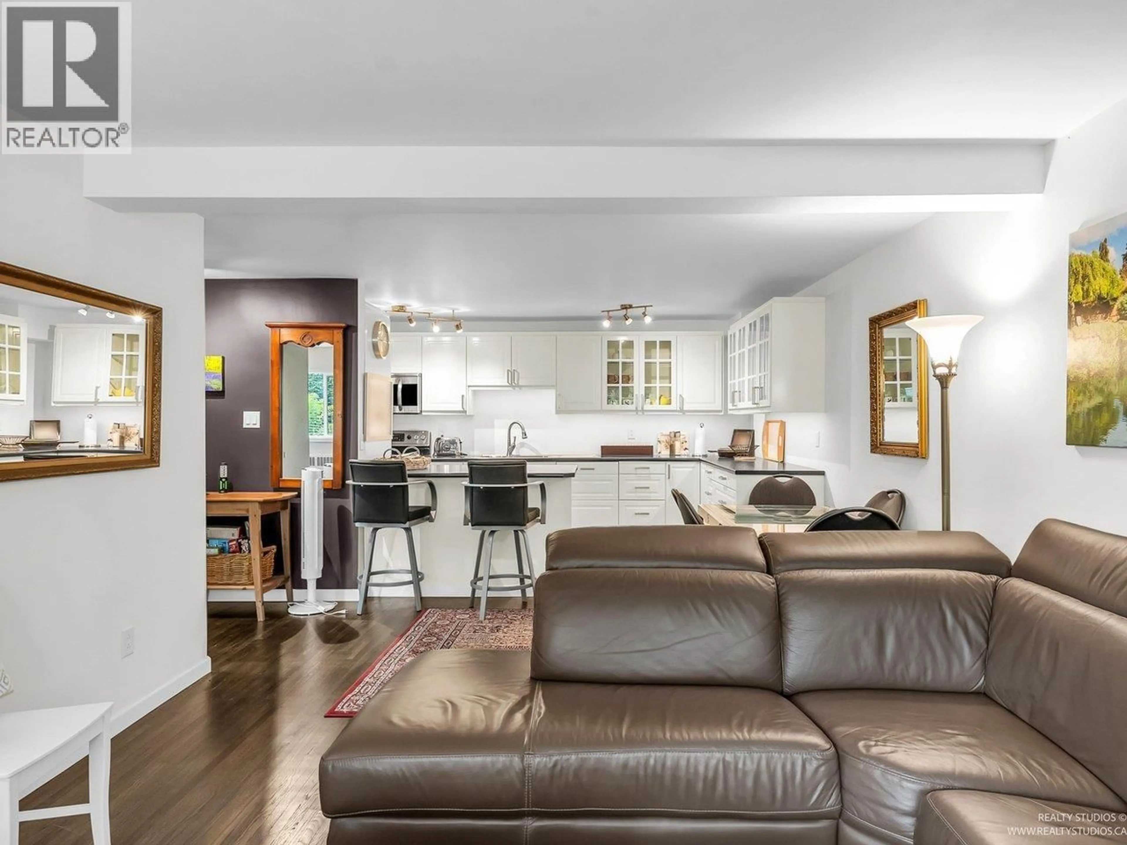 Open concept kitchen, wood/laminate floor for 3 - 2146 43RD AVENUE, Vancouver British Columbia V6M2E1