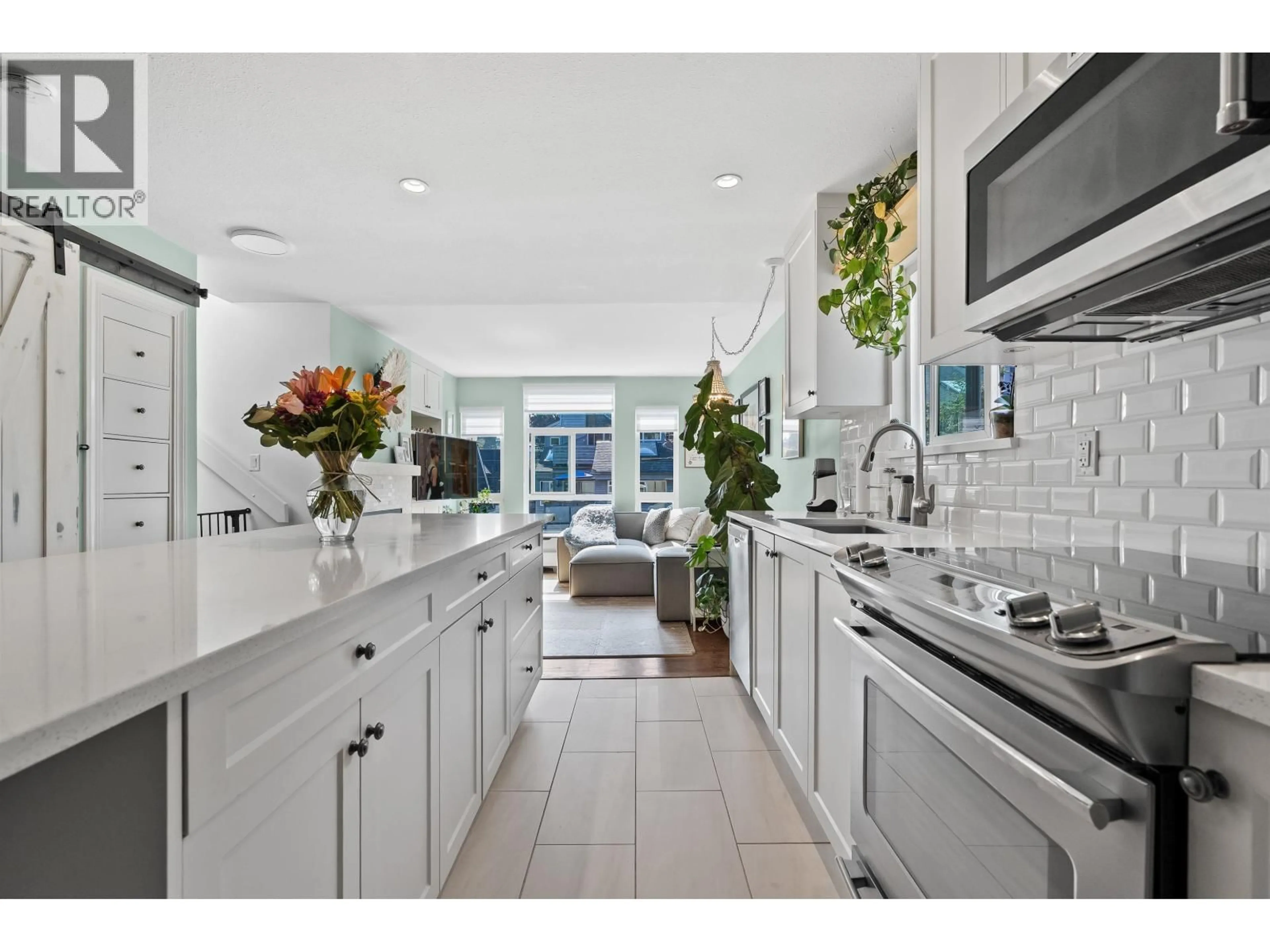 Open concept kitchen, ceramic/tile floor for 305 - 2110 CORNWALL AVENUE, Vancouver British Columbia V6K1B4