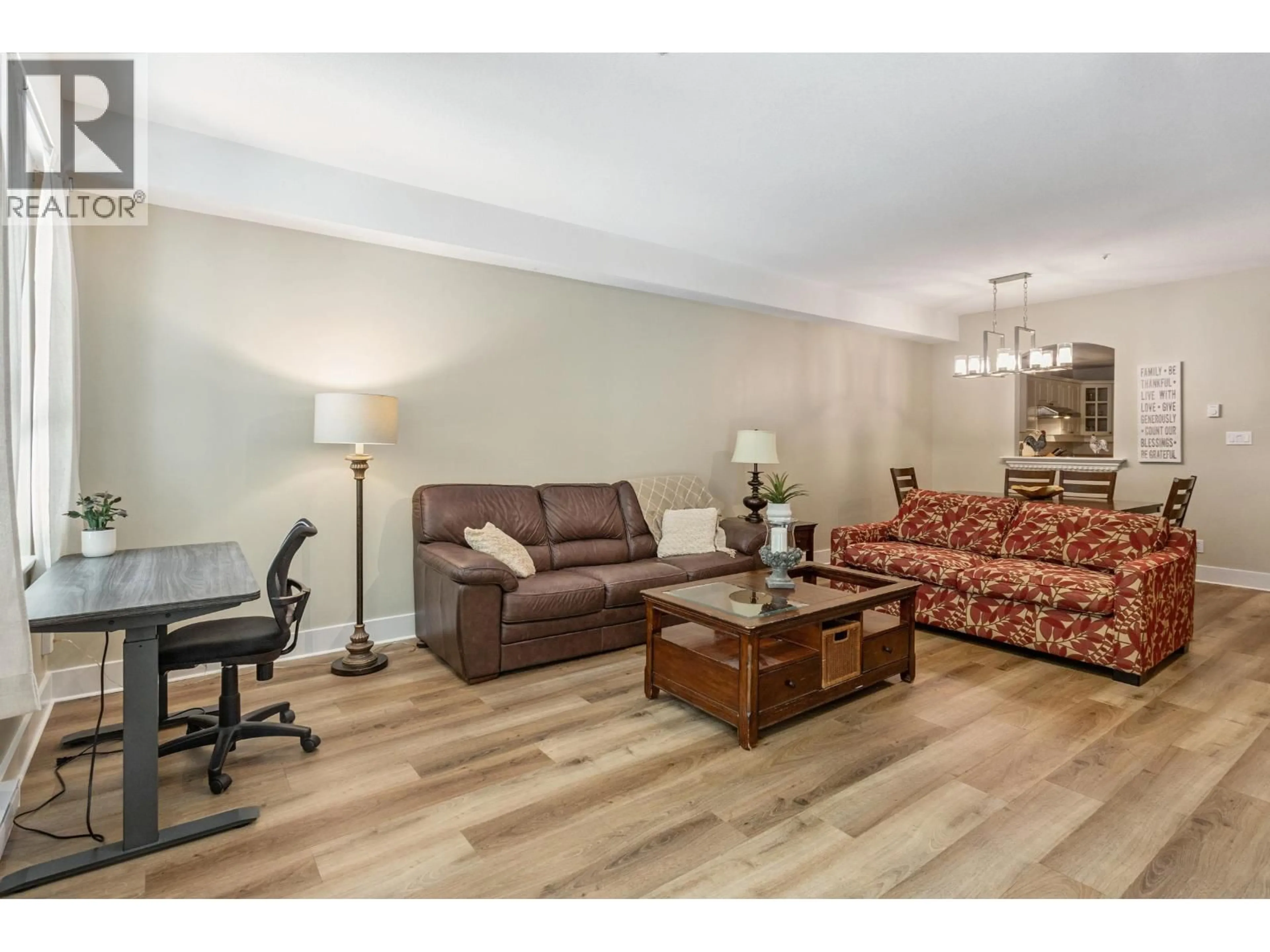 Living room with furniture, wood/laminate floor for 130 - 5835 HAMPTON PLACE, Vancouver British Columbia V6T2G2