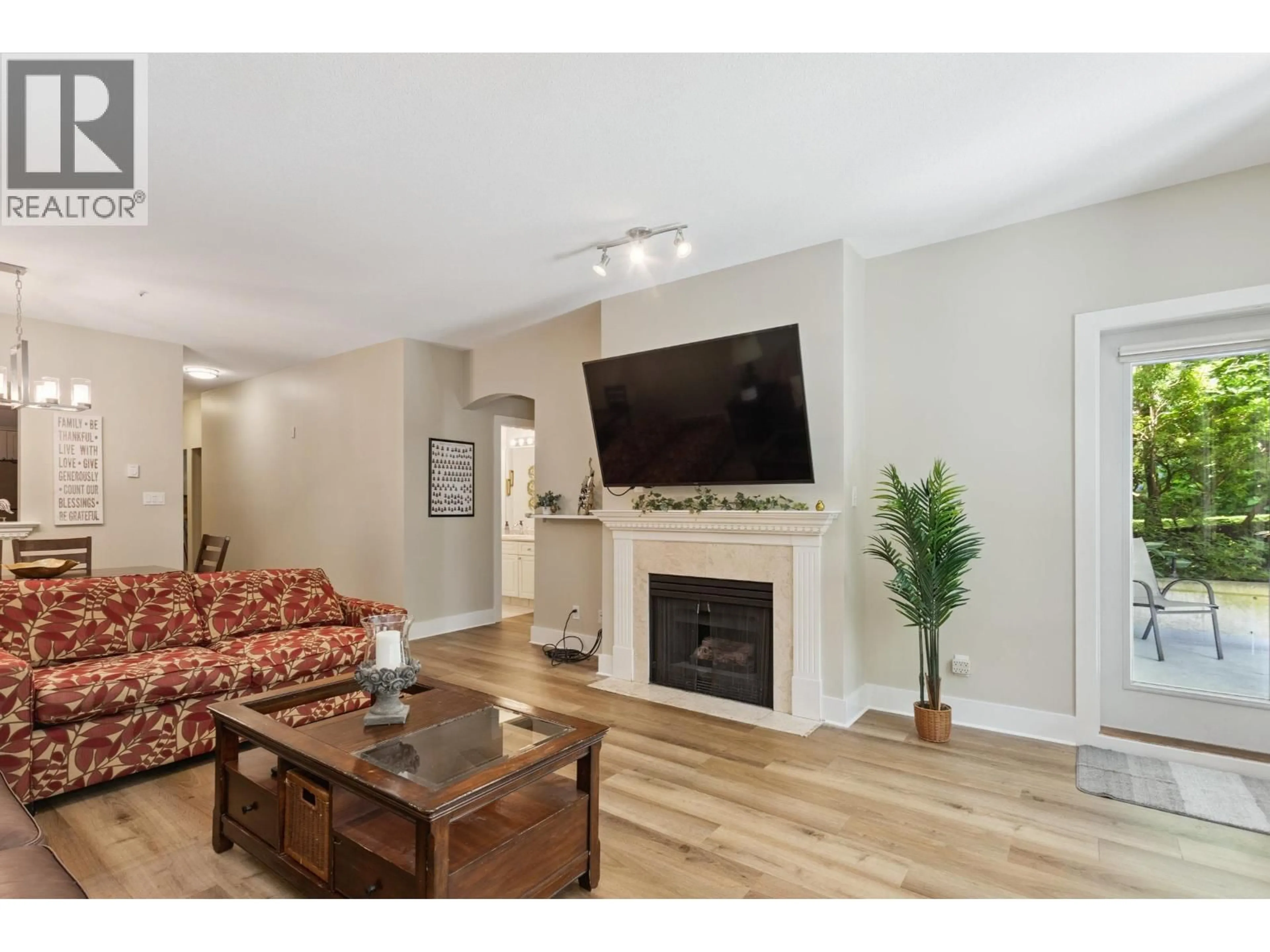 Living room with furniture, wood/laminate floor for 130 - 5835 HAMPTON PLACE, Vancouver British Columbia V6T2G2