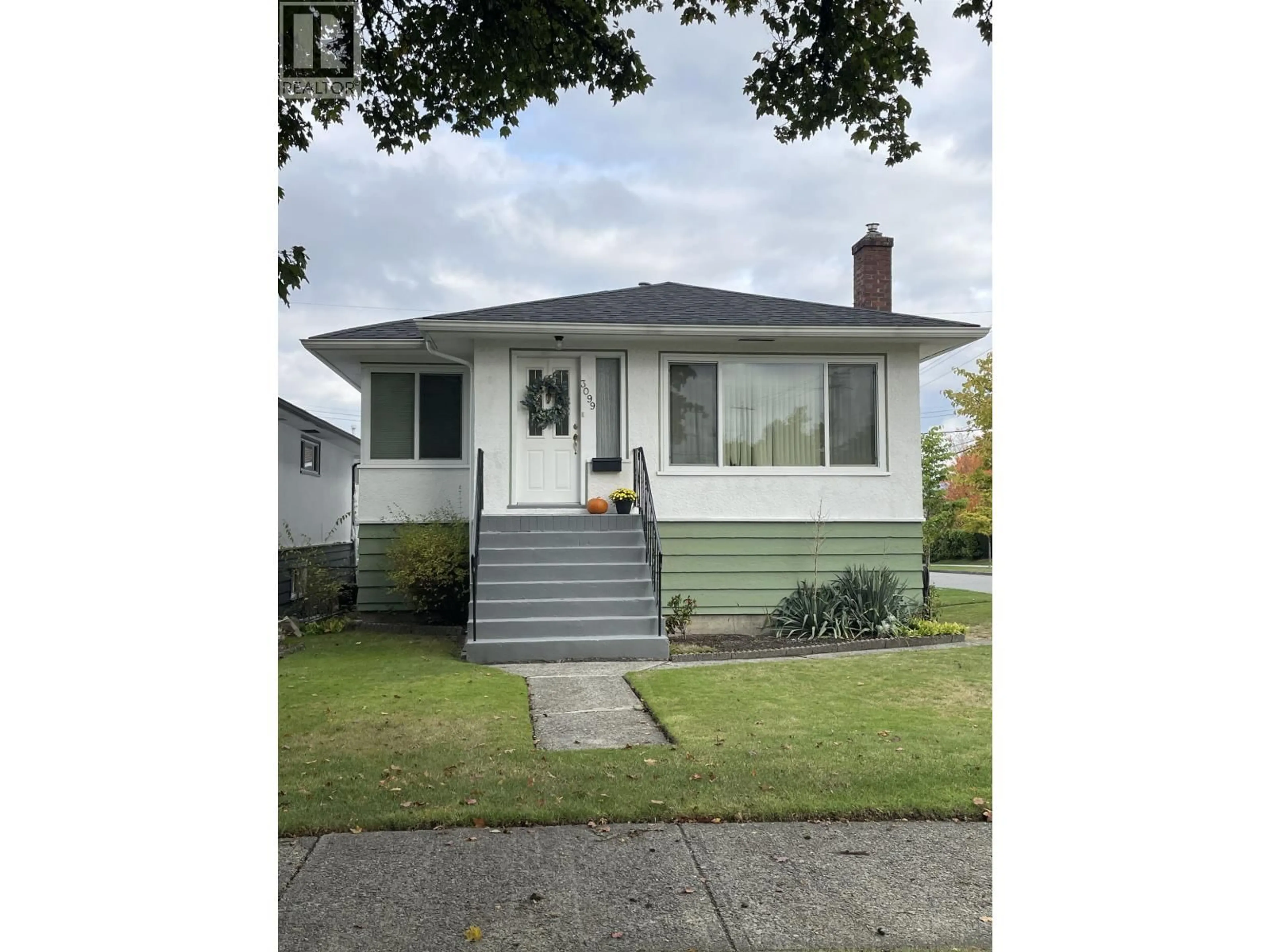 Home with vinyl exterior material, street for 3099 18TH AVENUE, Vancouver British Columbia V5M2R4