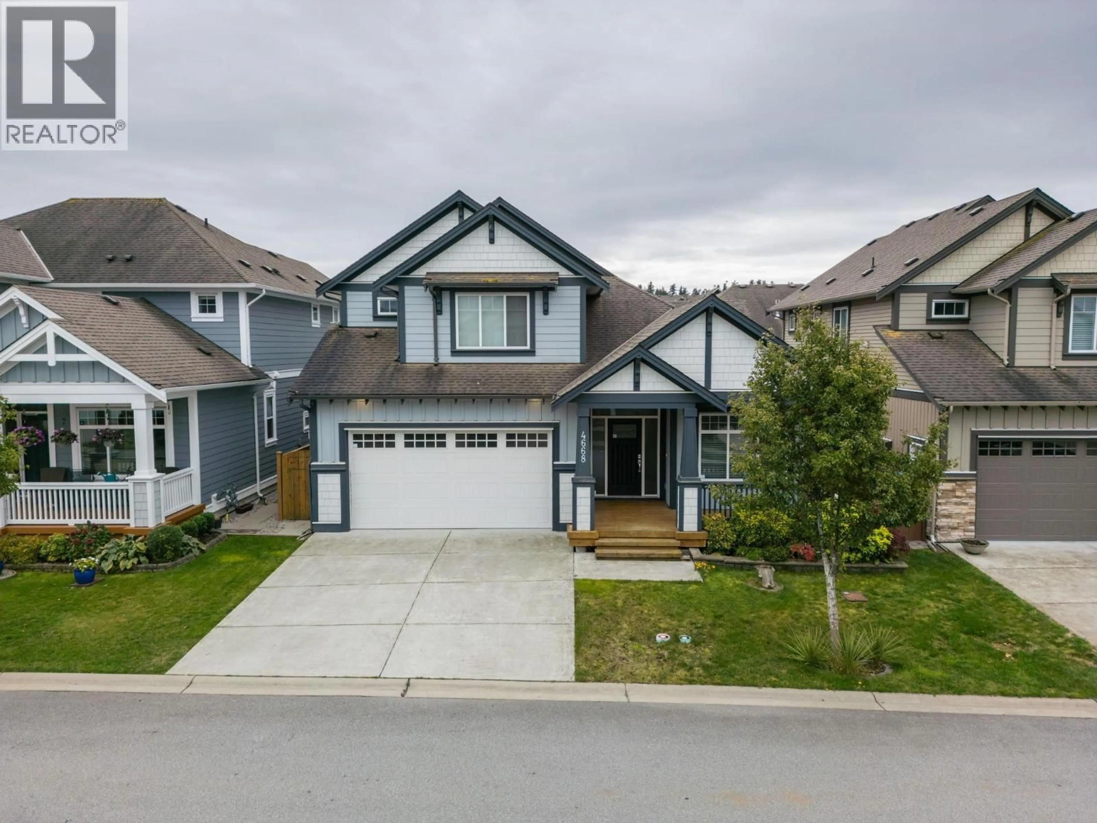 A pic from outside/outdoor area/front of a property/back of a property/a pic from drone, street for 4668 ROBIN LANE, Tsawwassen British Columbia V4M0B4