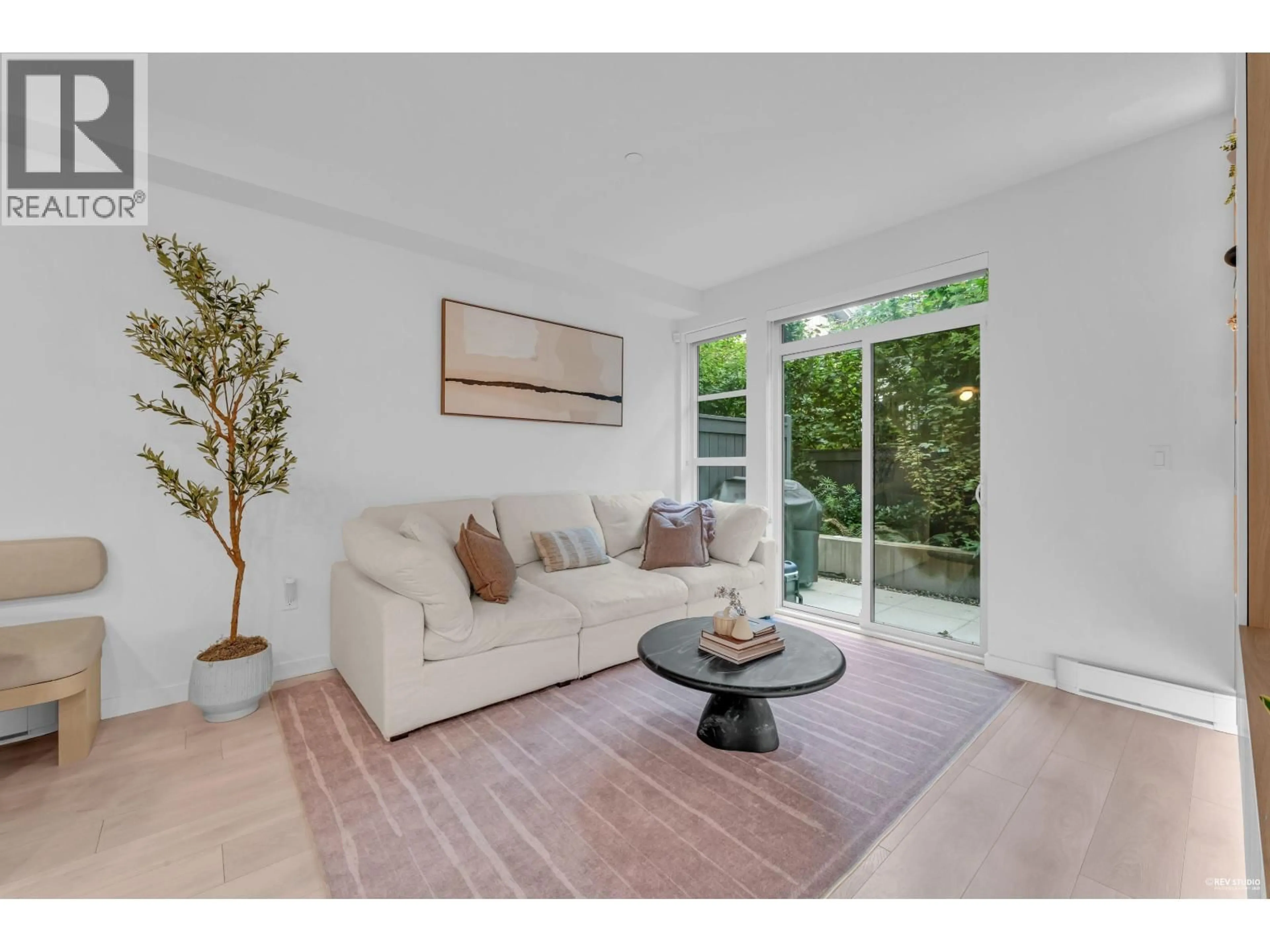 Living room with furniture, unknown for 128 - 2045 HERITAGE PARK LANE, North Vancouver British Columbia V7H0E3