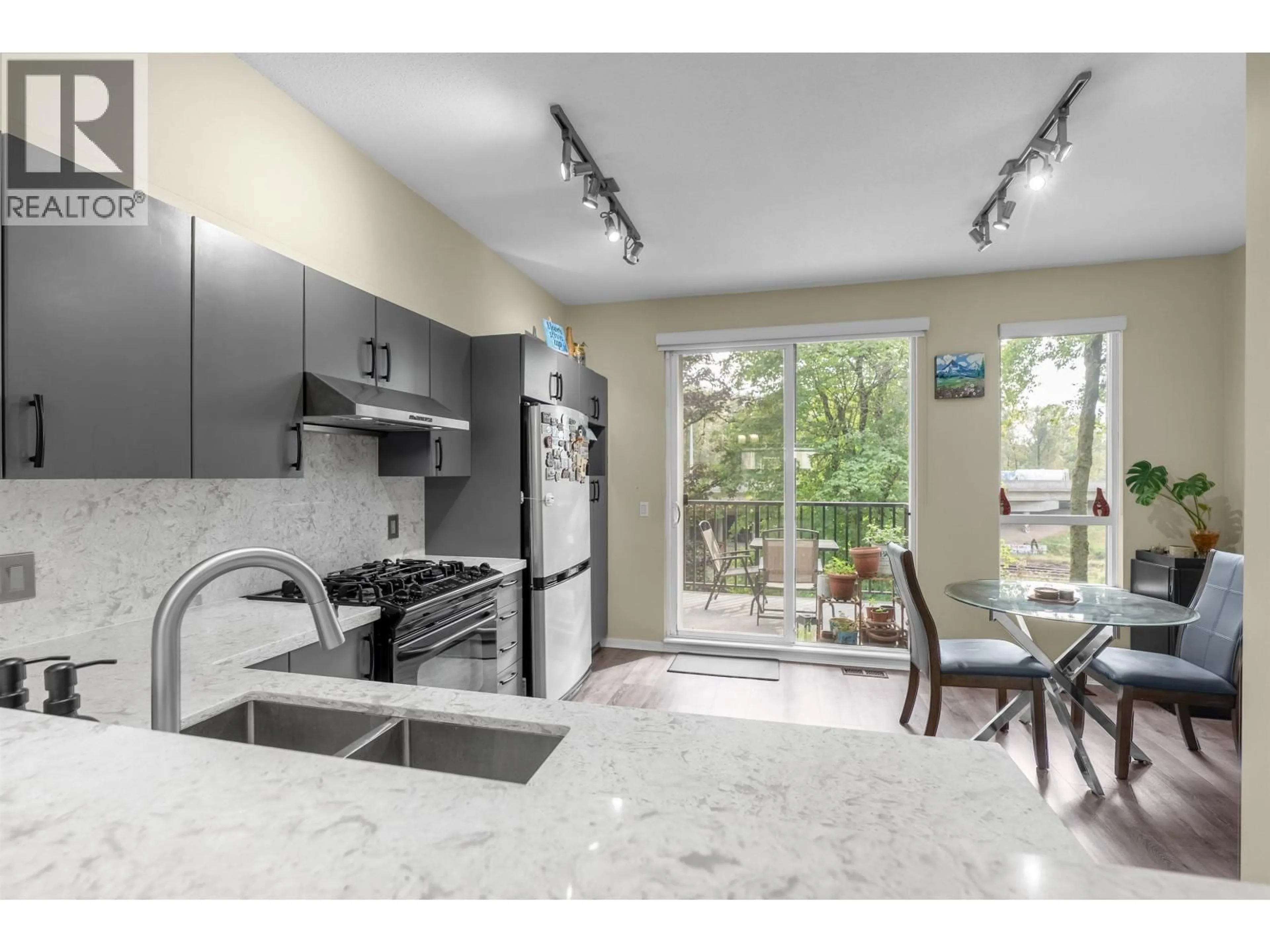 Open concept kitchen, ceramic/tile floor for 167 - 9133 GOVERNMENT STREET, Burnaby British Columbia V3N0B1