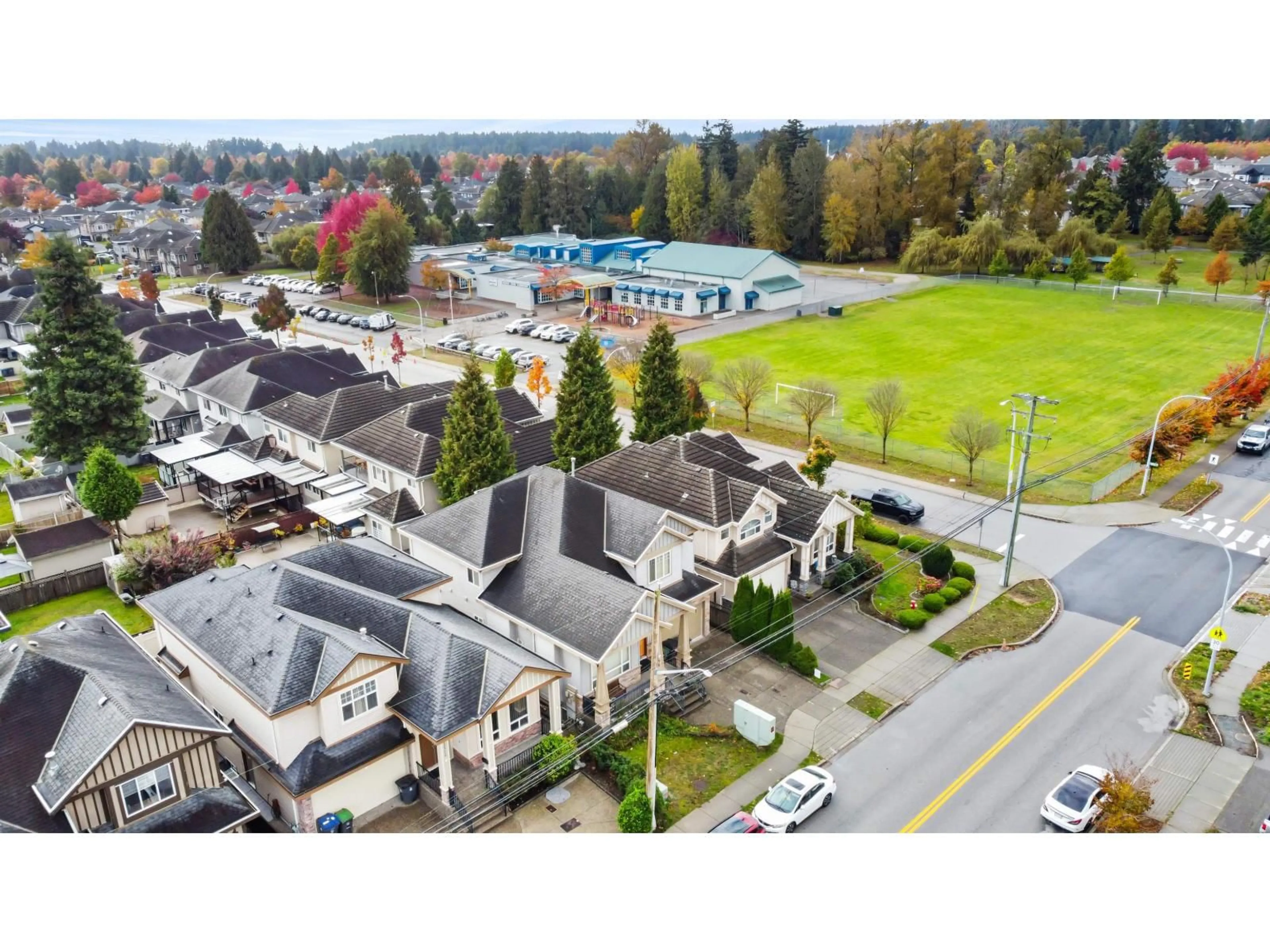 A pic from outside/outdoor area/front of a property/back of a property/a pic from drone, mountain view for 12366 66 AVENUE, Surrey British Columbia V3W2A4