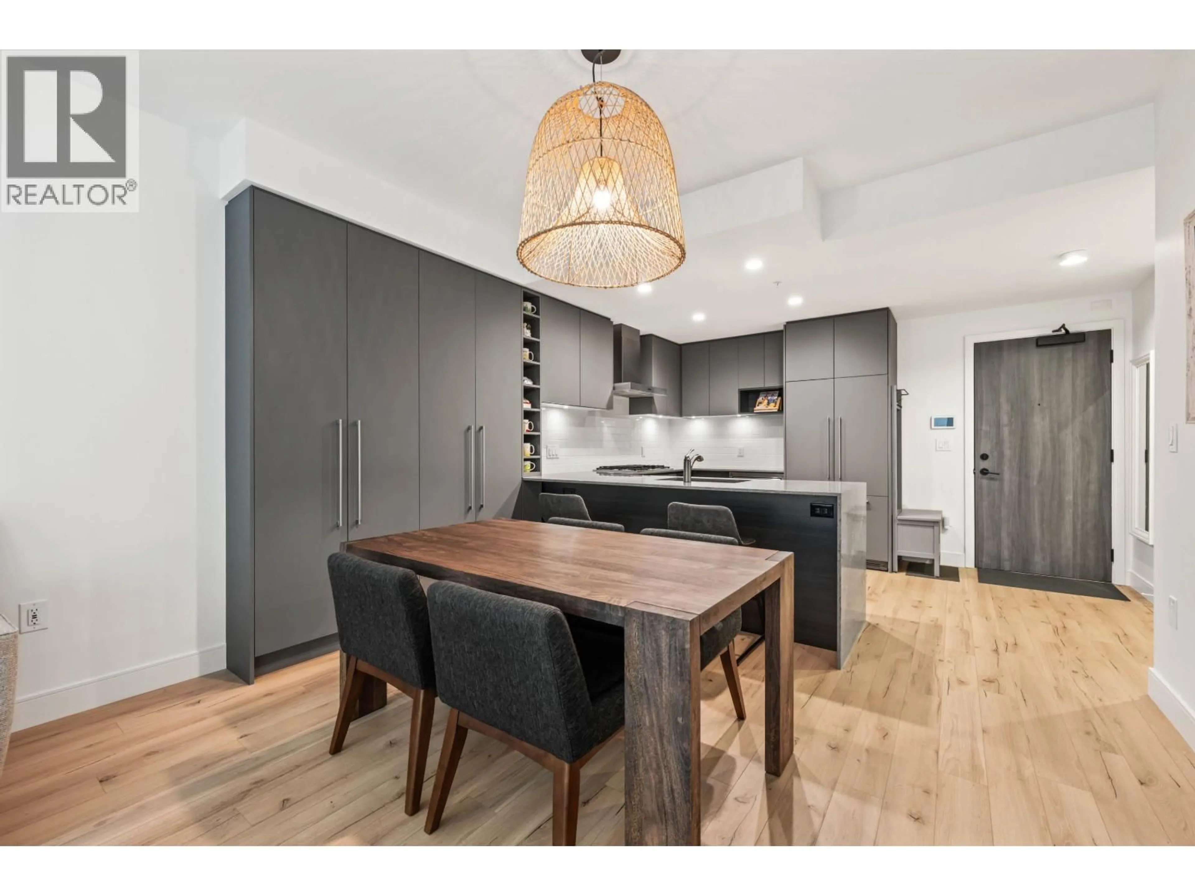 Open concept kitchen, wood/laminate floor for 322 - 3131 MURRAY STREET, Port Moody British Columbia V3H0L9