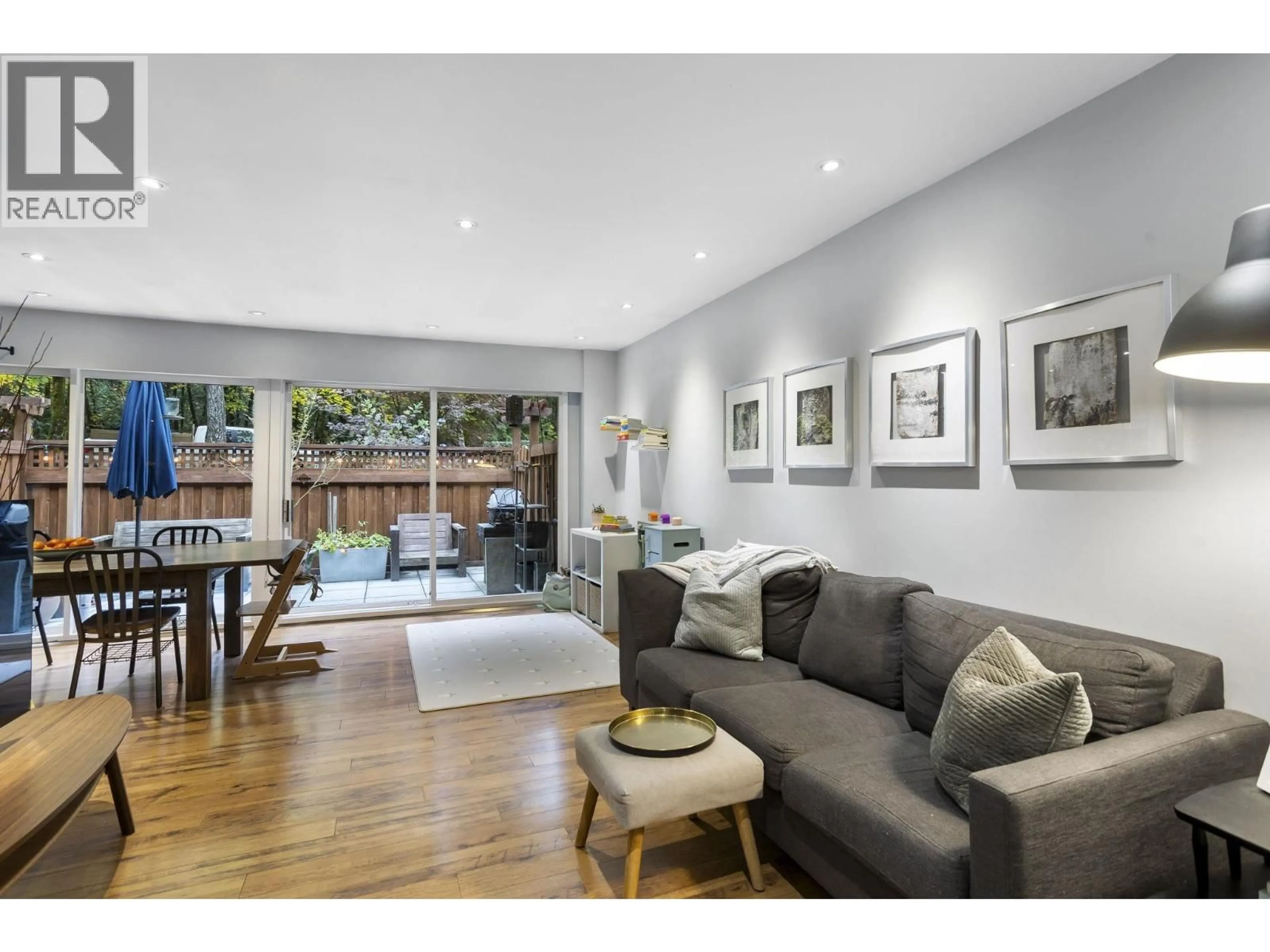 Living room with furniture, wood/laminate floor for 8904 CENTAURUS CIRCLE, Burnaby British Columbia V3J1C1