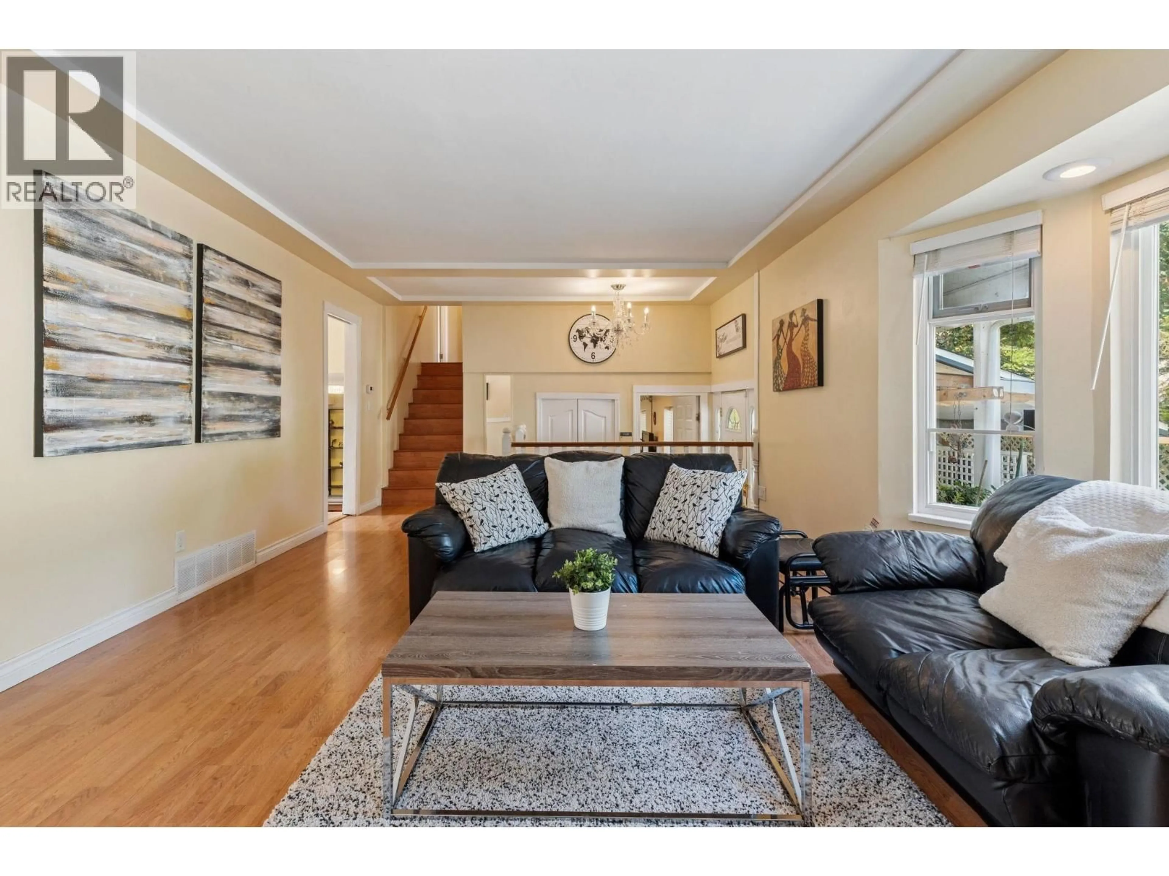 Living room with furniture, wood/laminate floor for 1068 SPRUCE STREET, Port Coquitlam British Columbia V3B4X6