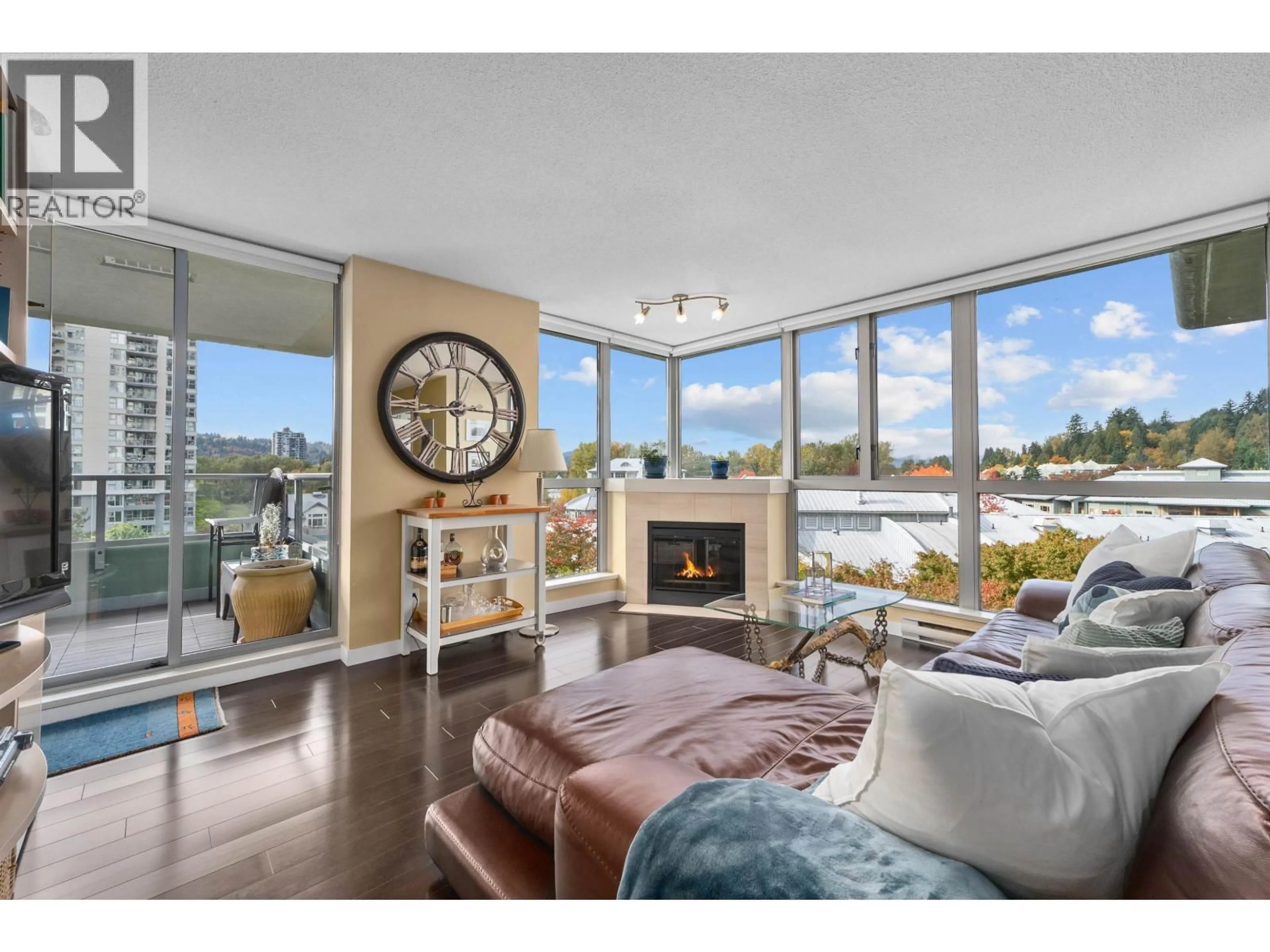 Living room with furniture, unknown for 405 - 295 GUILDFORD WAY, Port Moody British Columbia V3H5N3