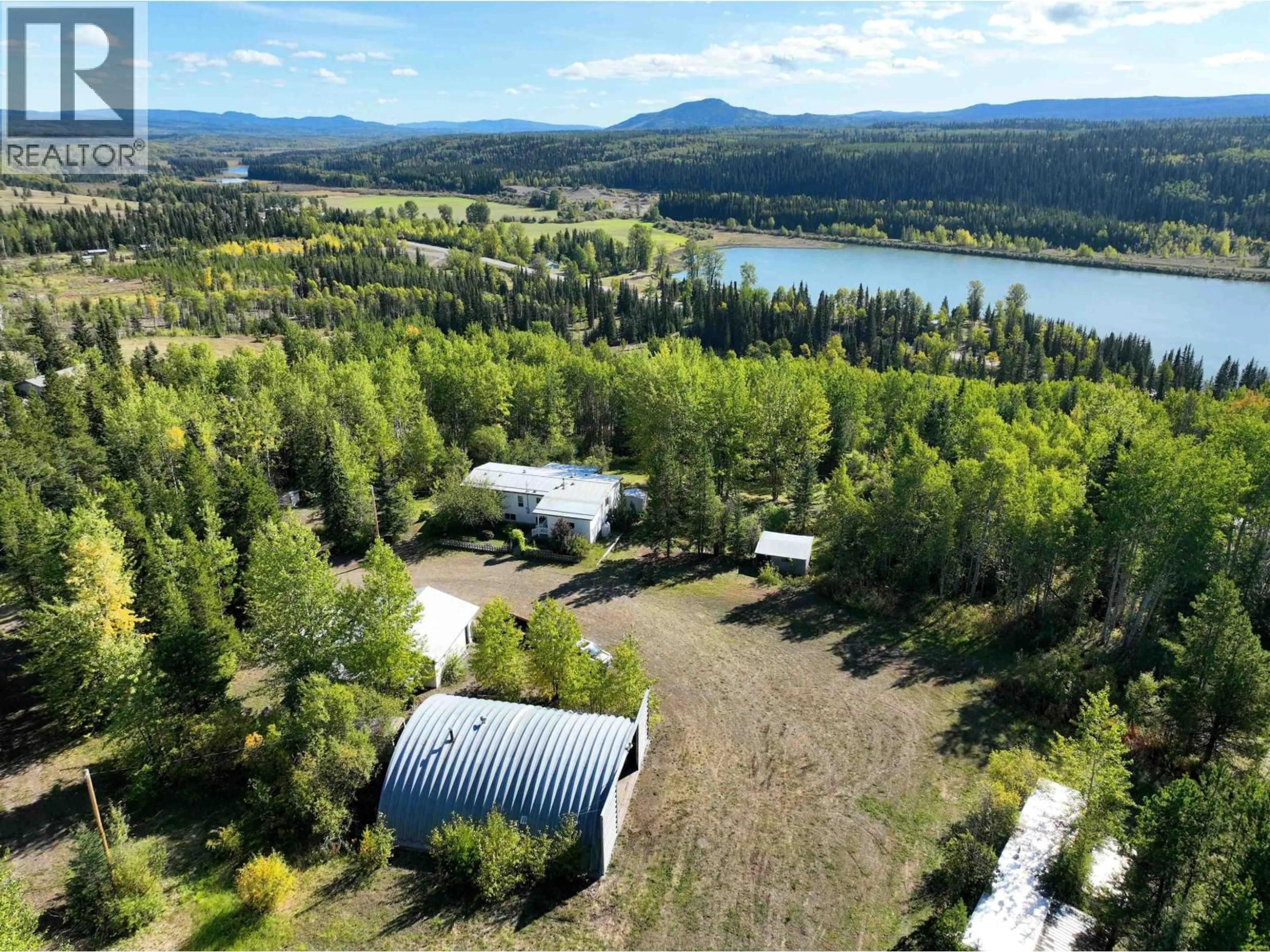 A pic from outside/outdoor area/front of a property/back of a property/a pic from drone, unknown for 20655 HOSSACK ROAD, Burns Lake British Columbia V0J1E1