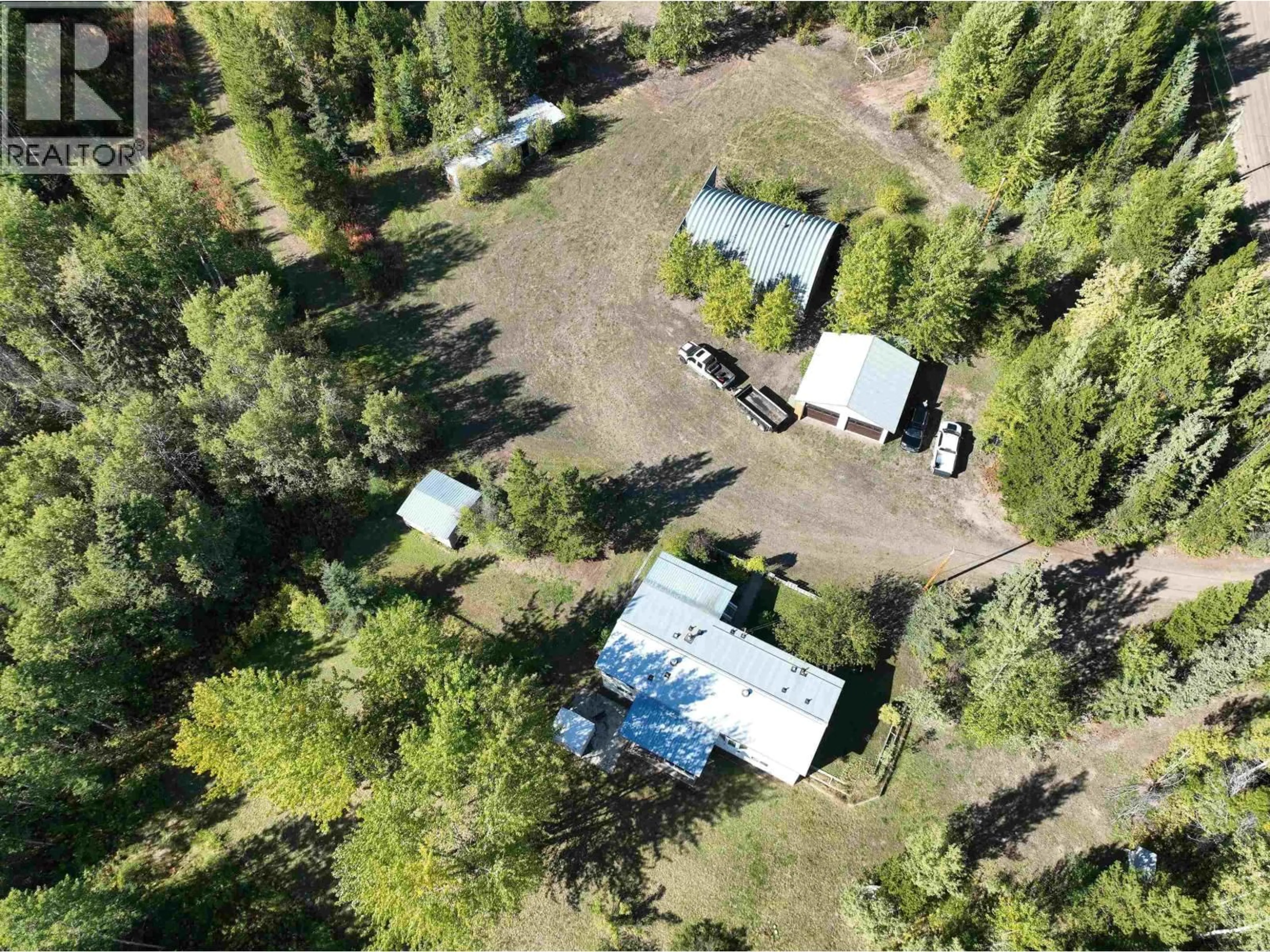 A pic from outside/outdoor area/front of a property/back of a property/a pic from drone, forest/trees view for 20655 HOSSACK ROAD, Burns Lake British Columbia V0J1E1