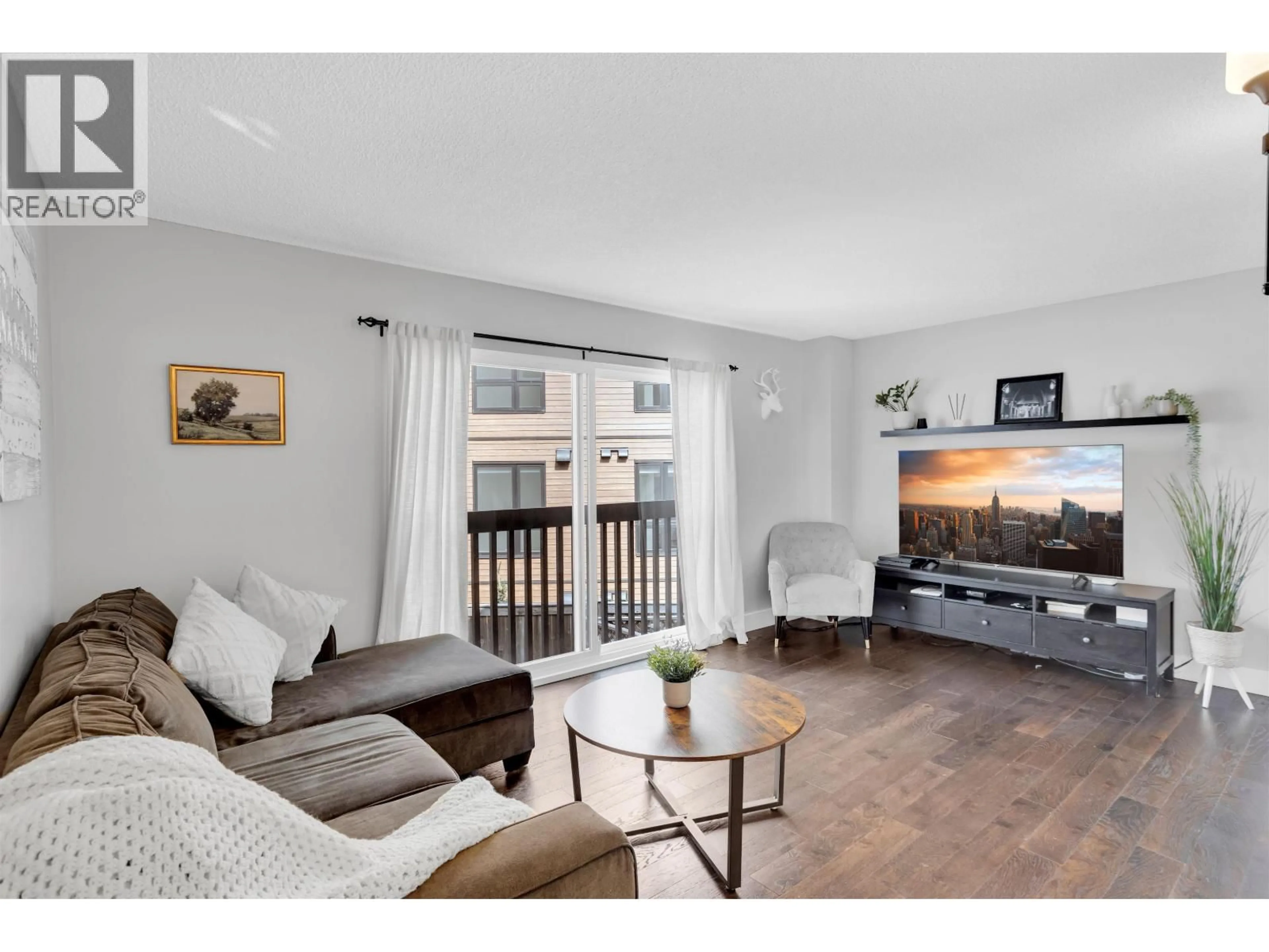 Living room with furniture, wood/laminate floor for 160 JAMES ROAD, Port Moody British Columbia V3H2S4