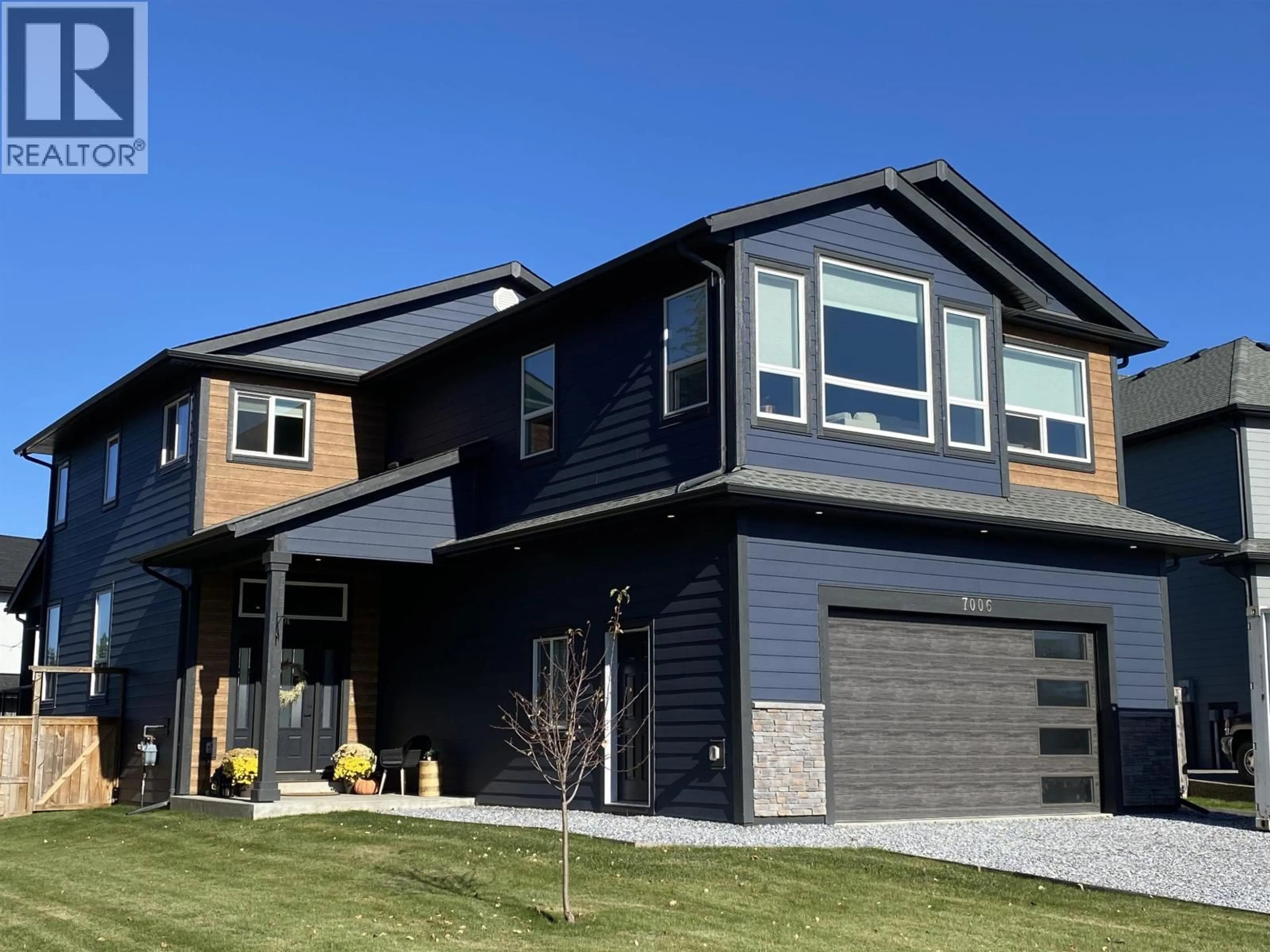 Home with vinyl exterior material, street for 7006 STONECREEK PLACE, Prince George British Columbia V2N0H2