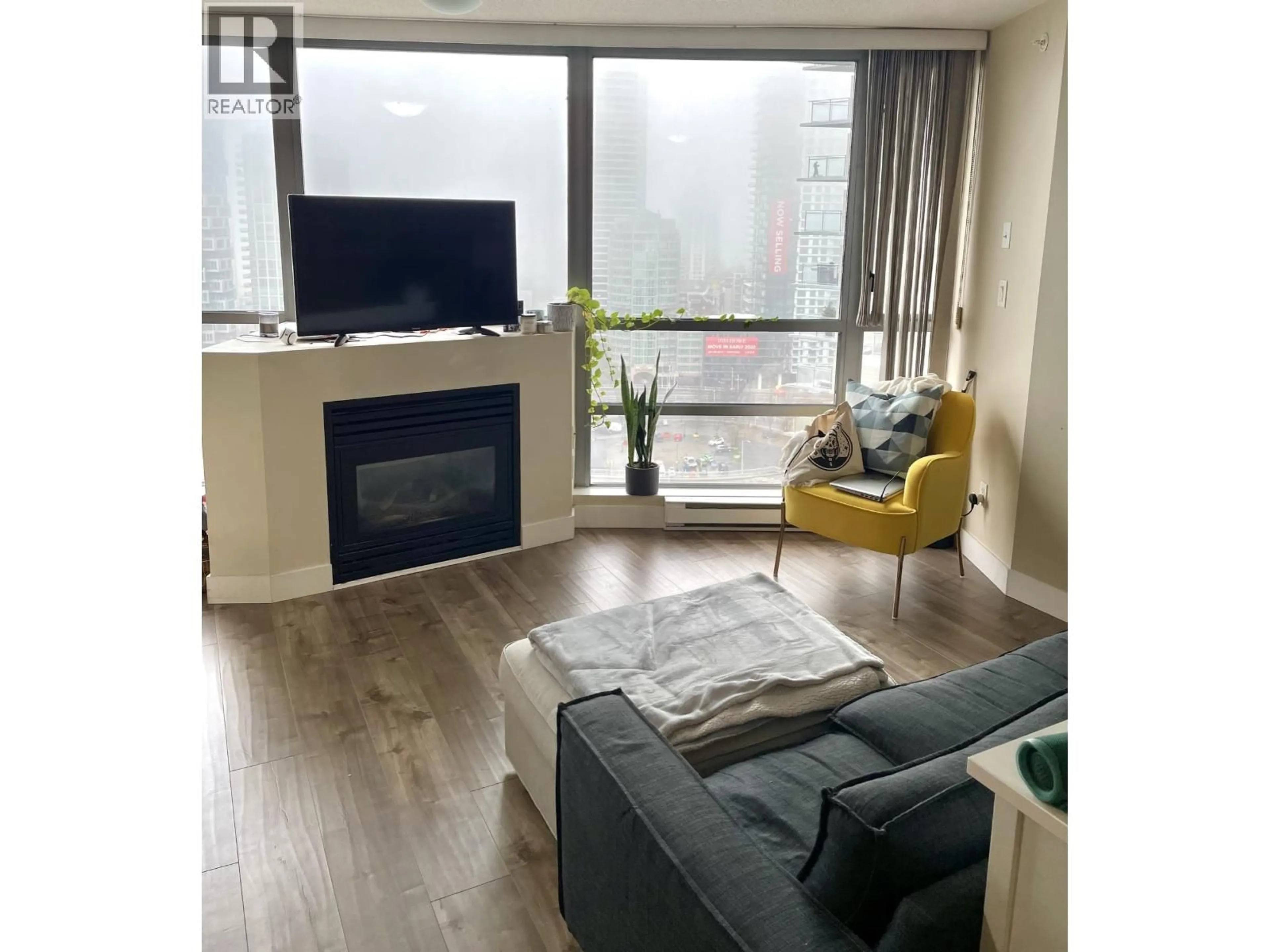 Living room with furniture, wood/laminate floor for 2705 - 501 PACIFIC STREET, Vancouver British Columbia V6Z2X6